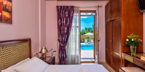 a bedroom with a large window