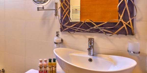 a bathroom with a sink and mirror