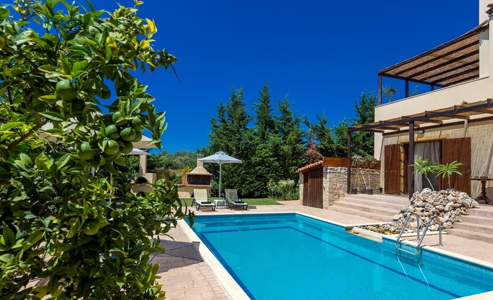 a swimming pool outside a house