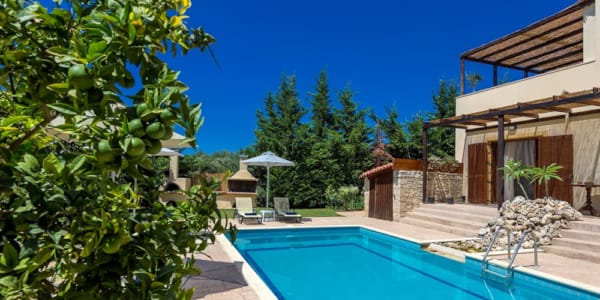 a swimming pool outside a house