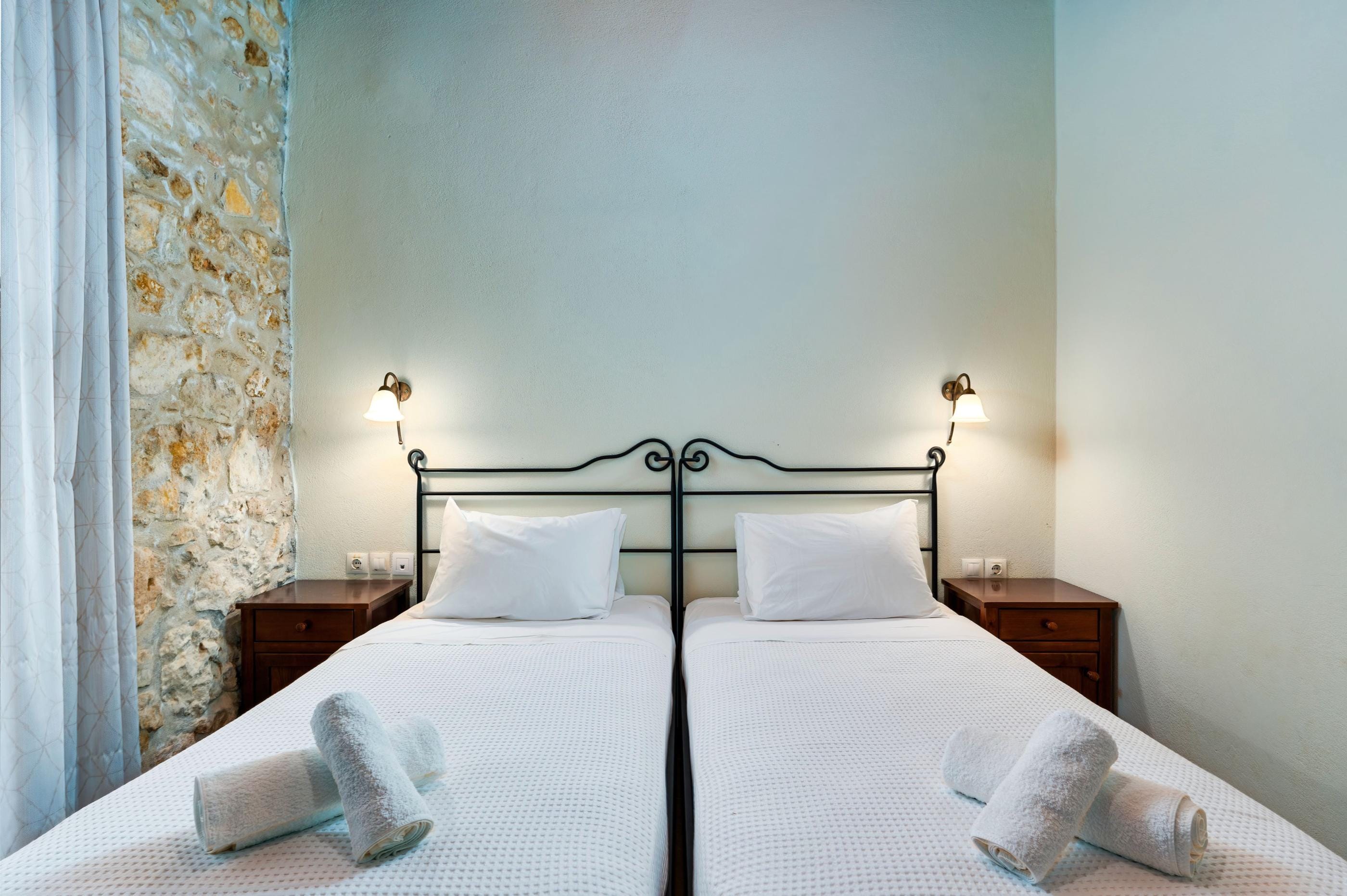 a bed with white sheets