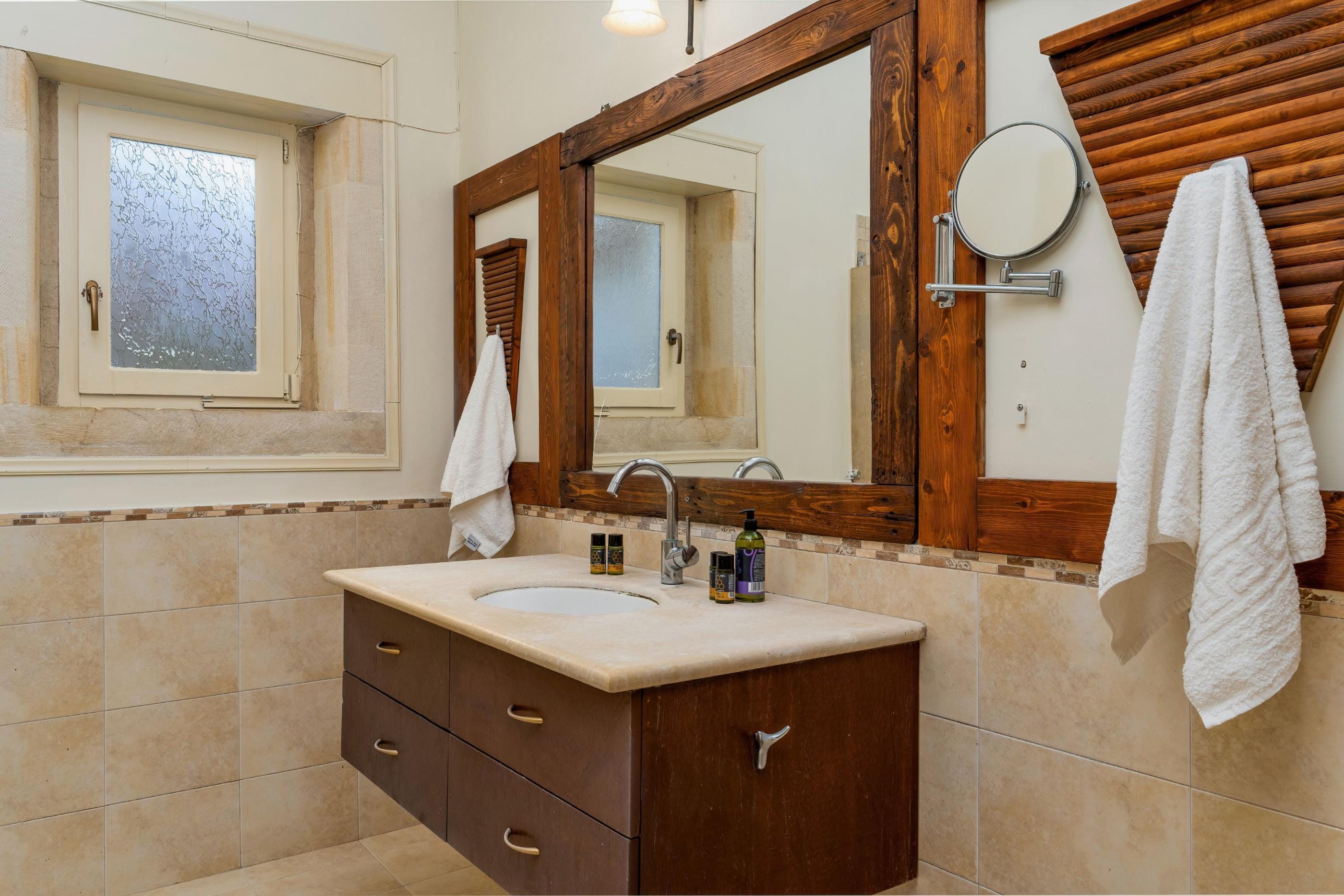 a bathroom with a large mirror