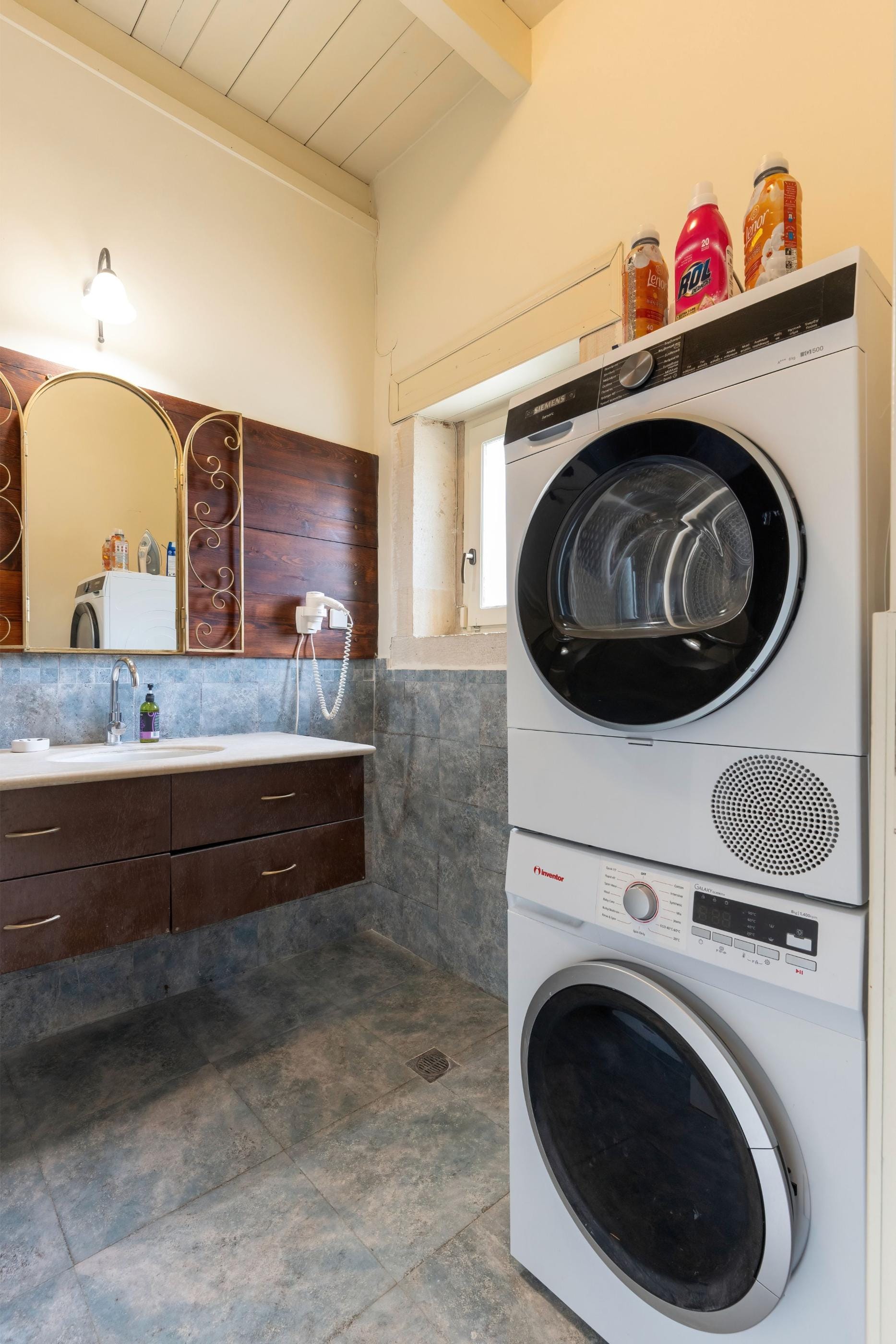 a washing machine in a bathroom