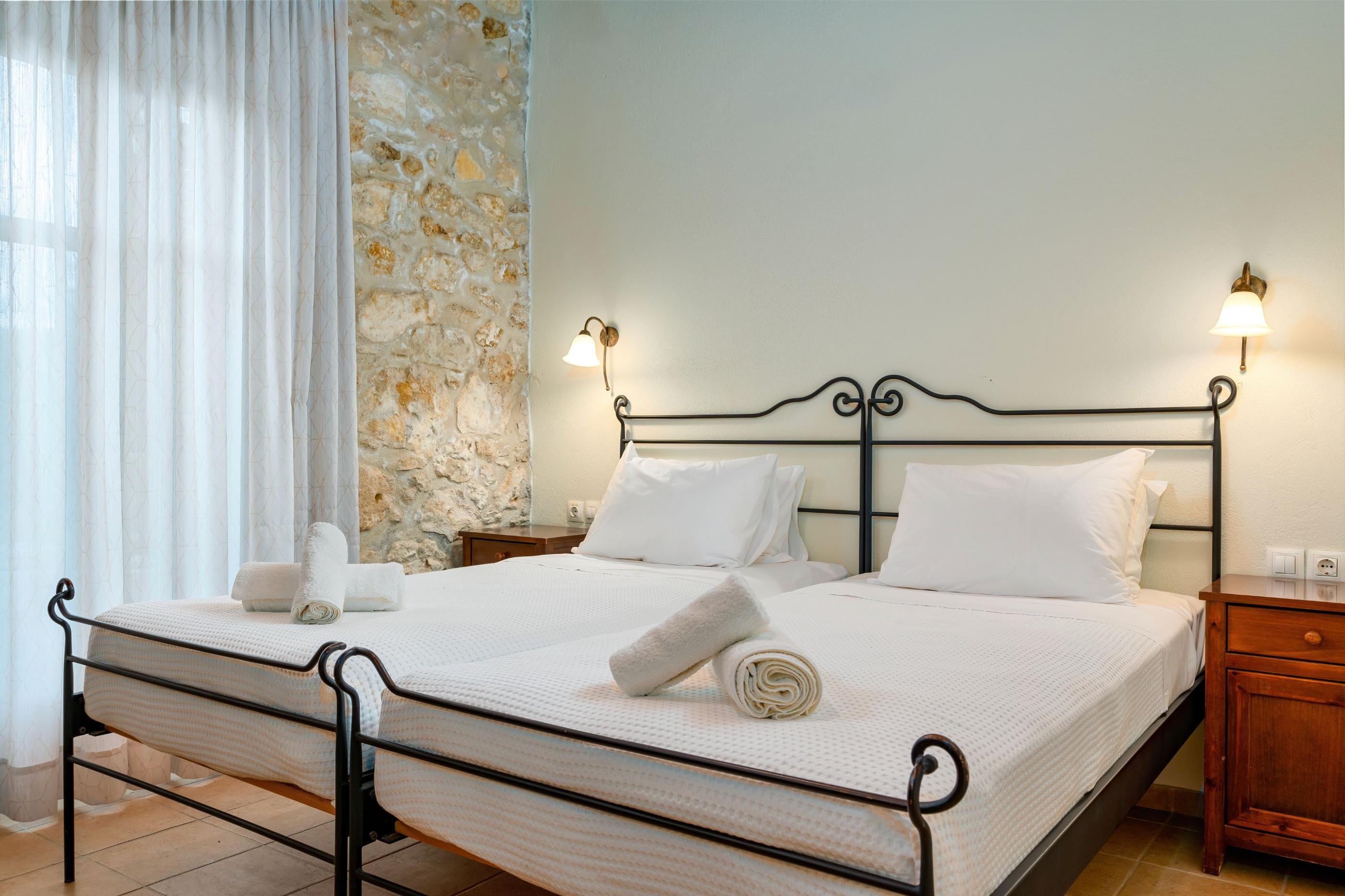 a bed with white sheets