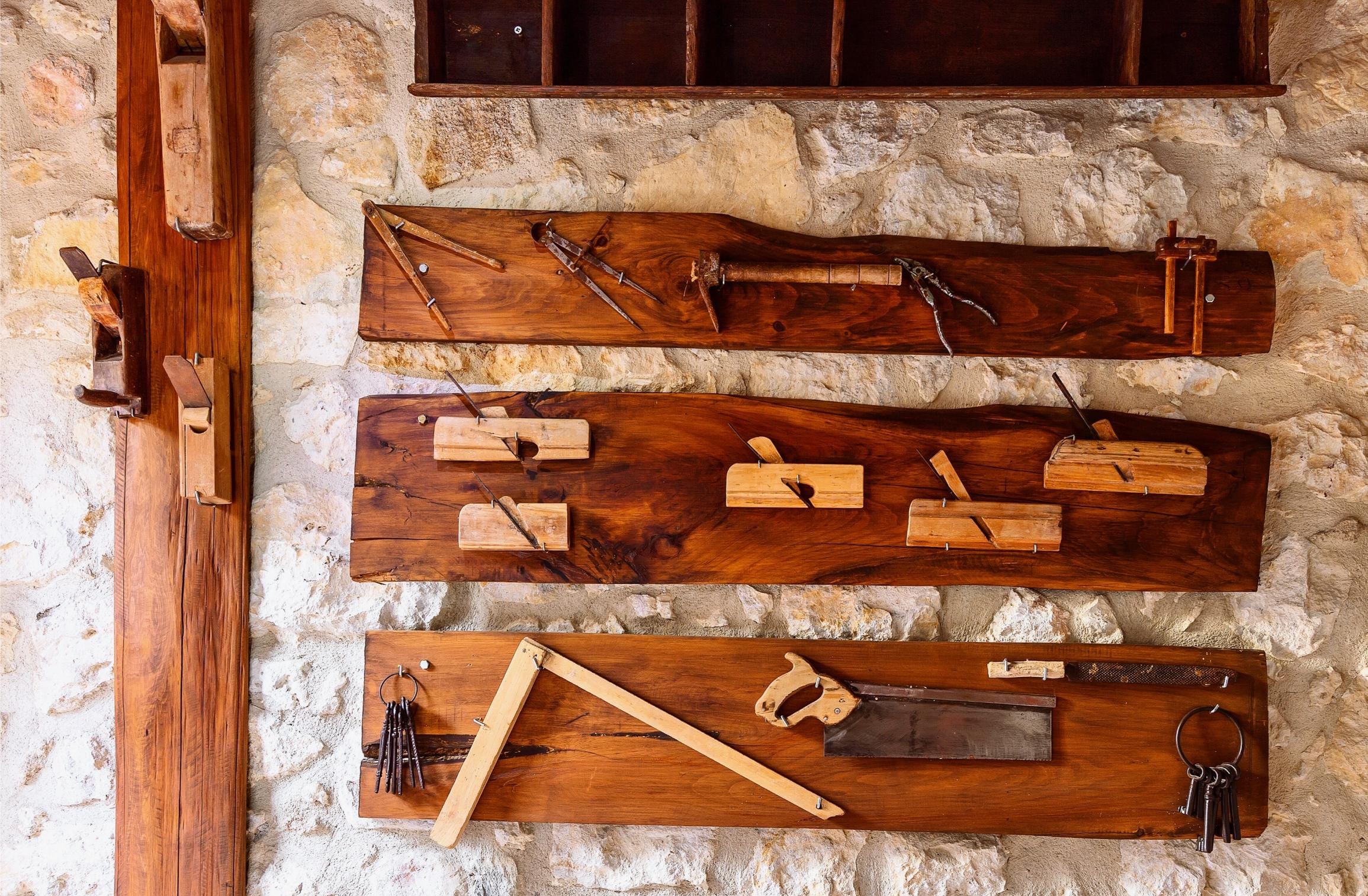 a wooden boat with a few boats