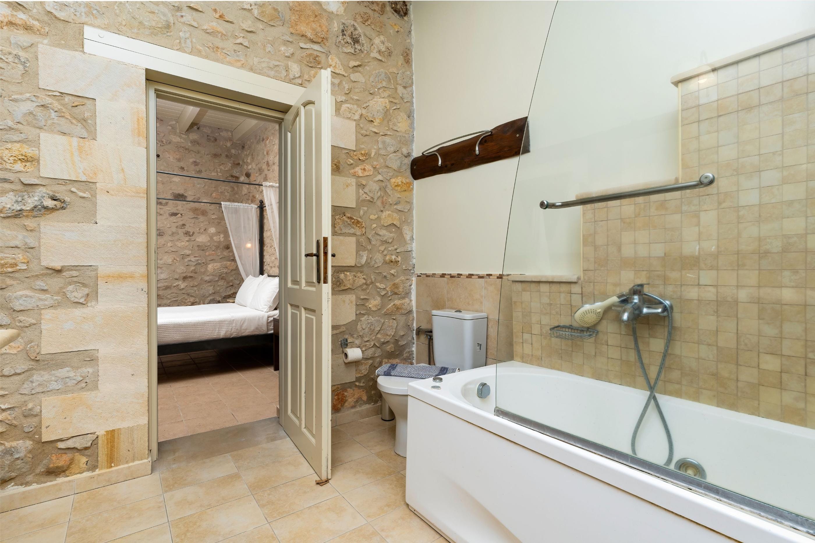 a bathroom with a glass shower