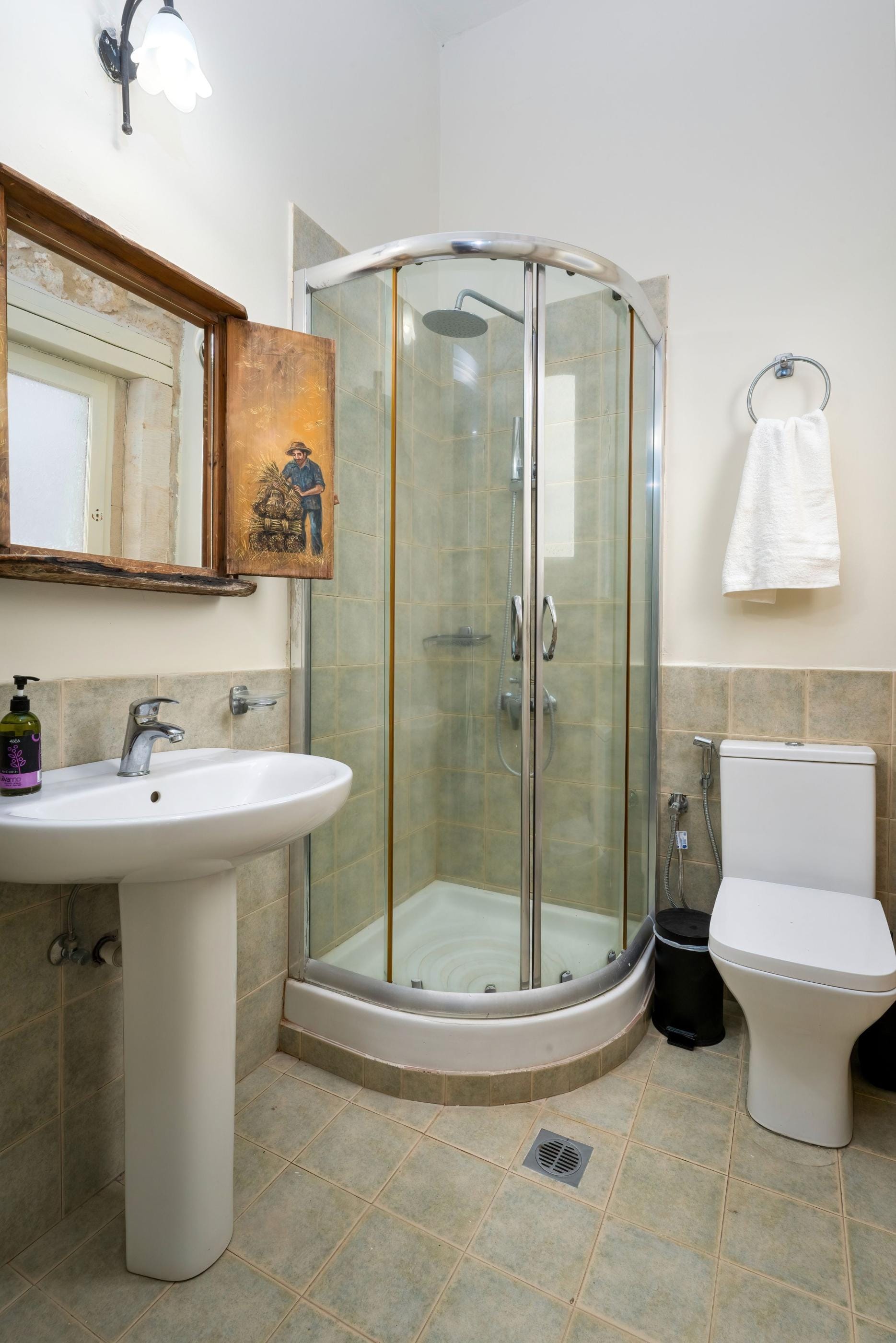 a bathroom with a glass shower