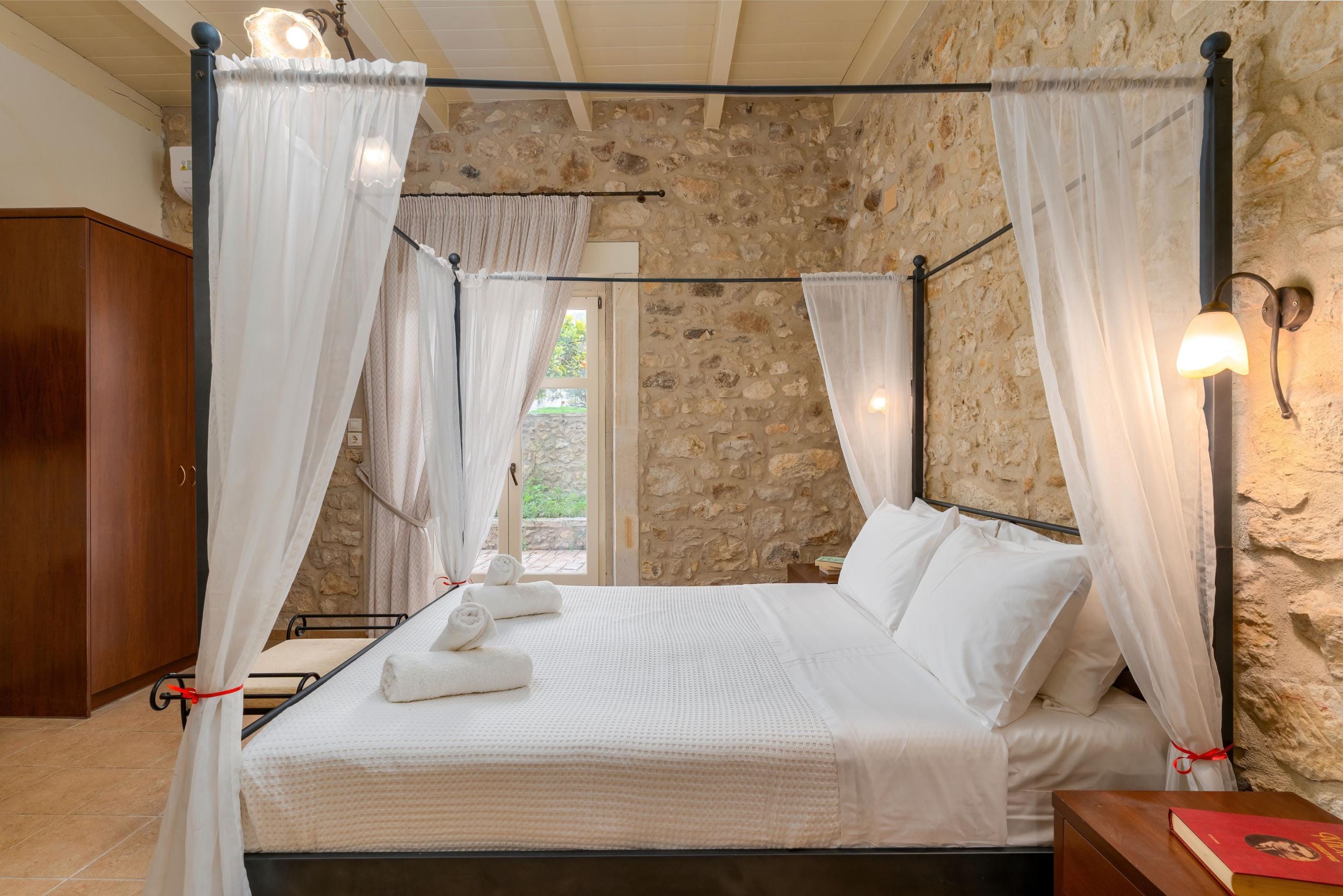 a bed with white sheets