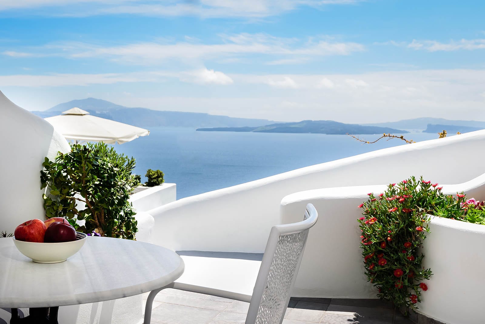 a balcony overlooking the ocean