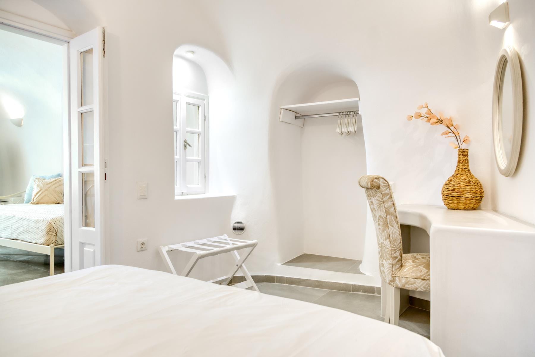 a bedroom with a bed and a table