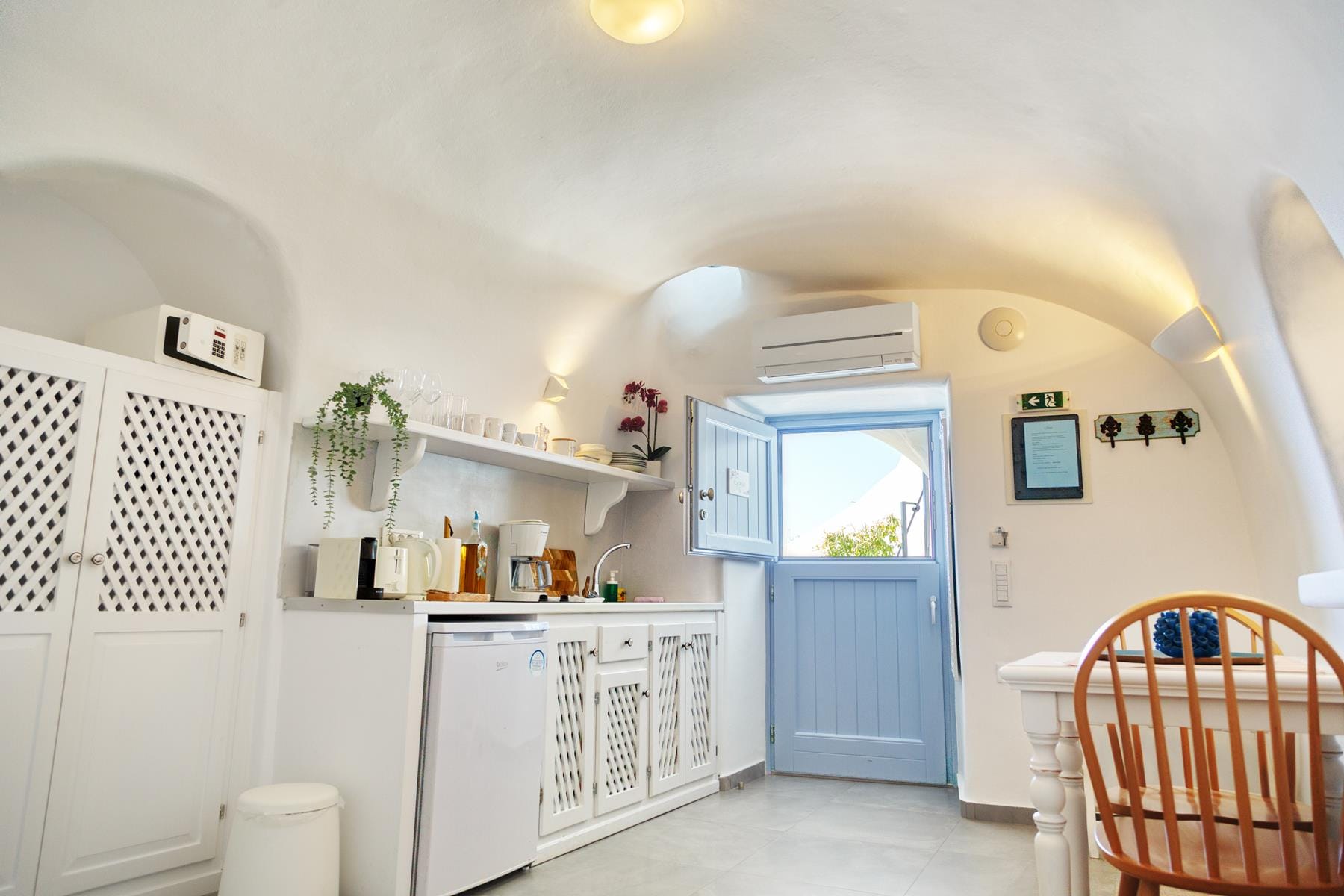 a kitchen with white cabinets
