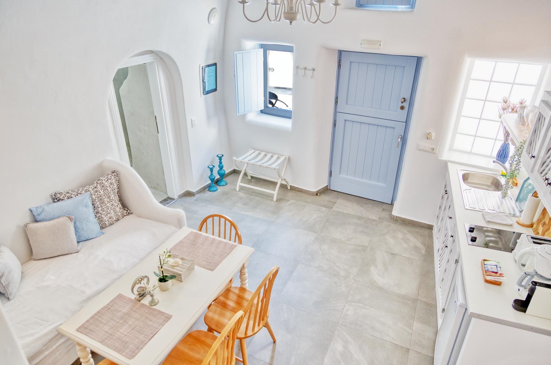 a living room with a couch and table