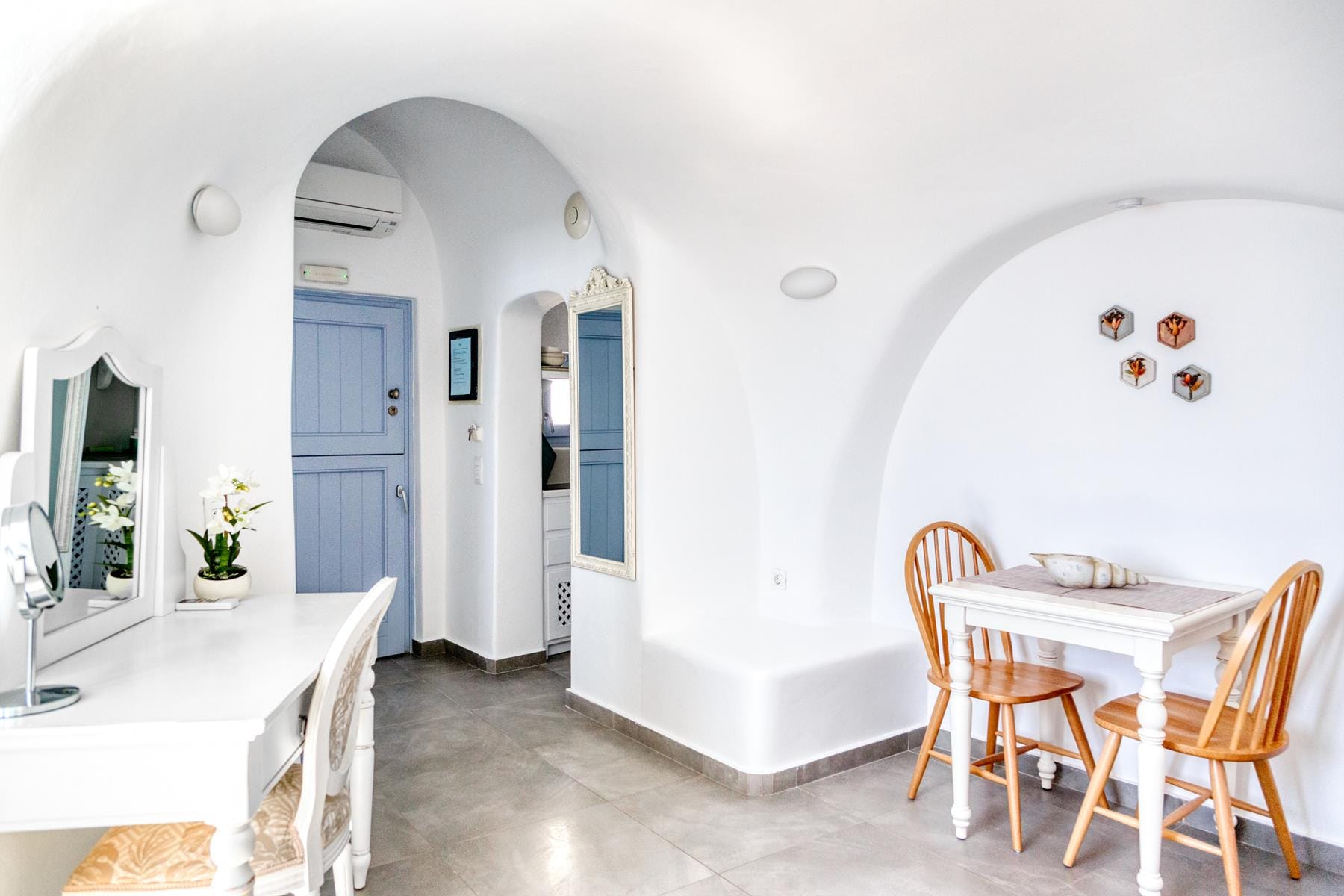 a room with tables and chairs
