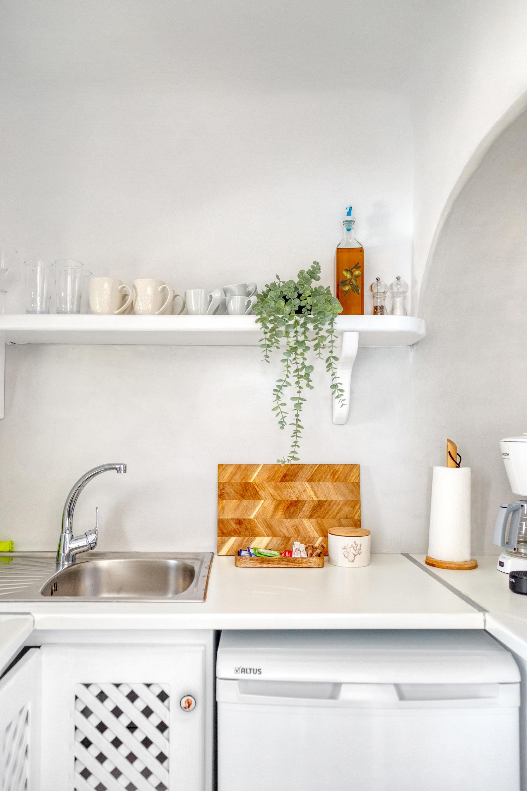 a kitchen with white cabinets