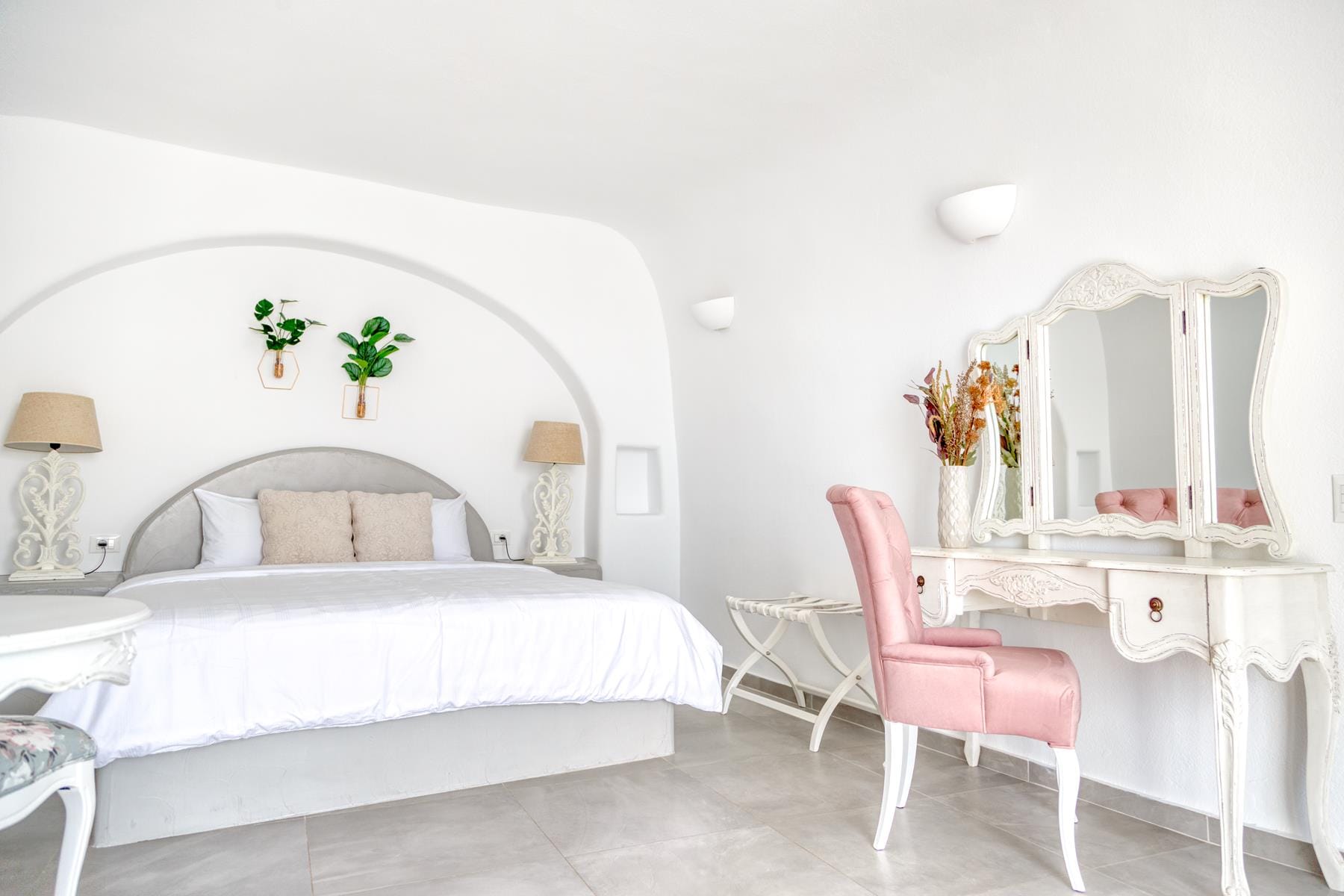 a bedroom with a bed and a desk