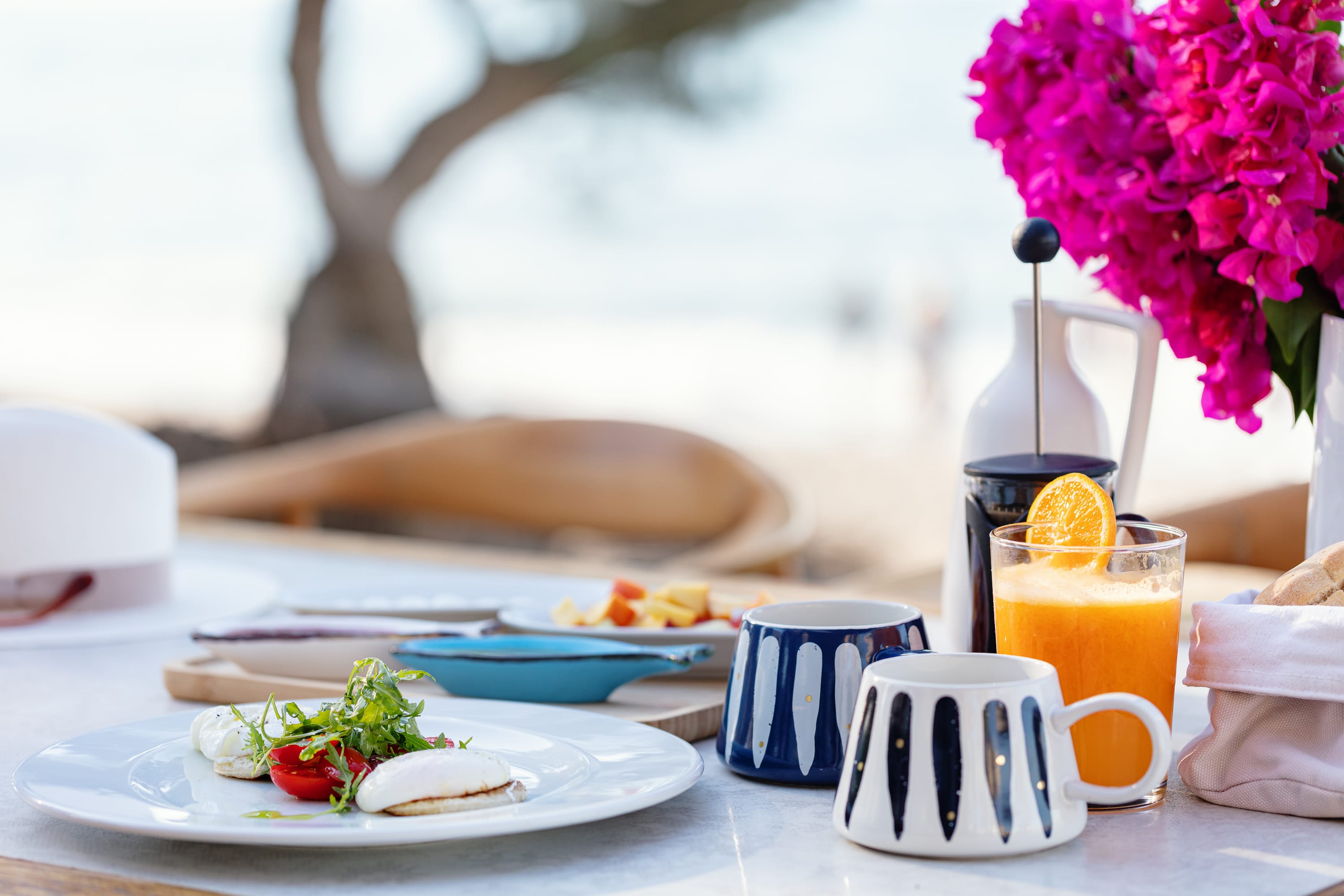 a table with plates and cups