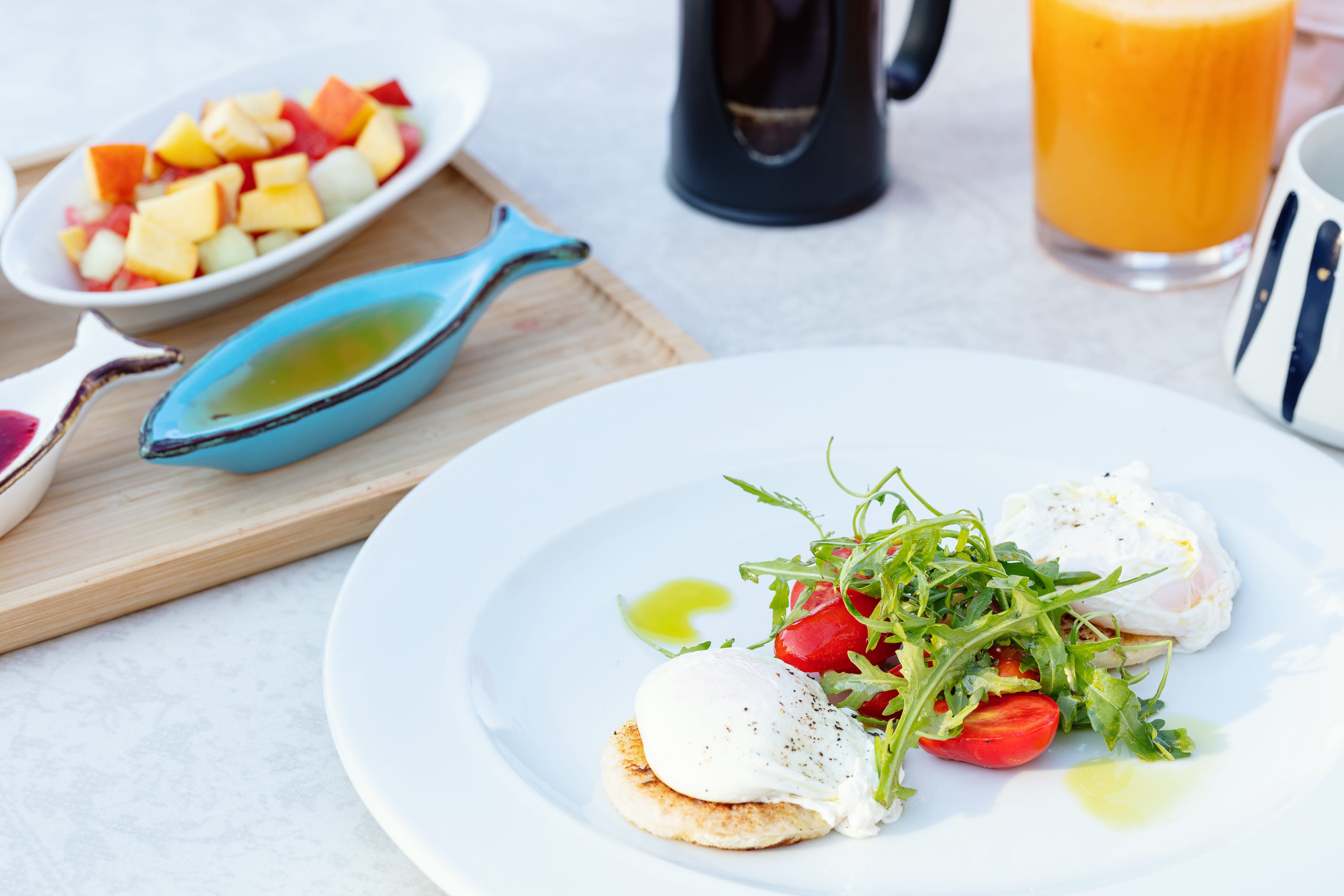 a plate of food and a bowl of salad