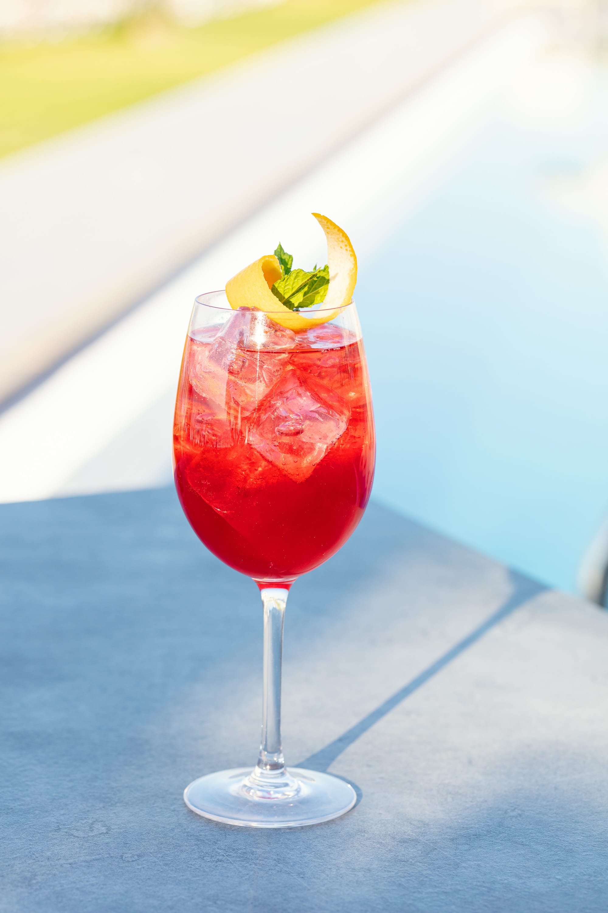 a glass with a drink in it