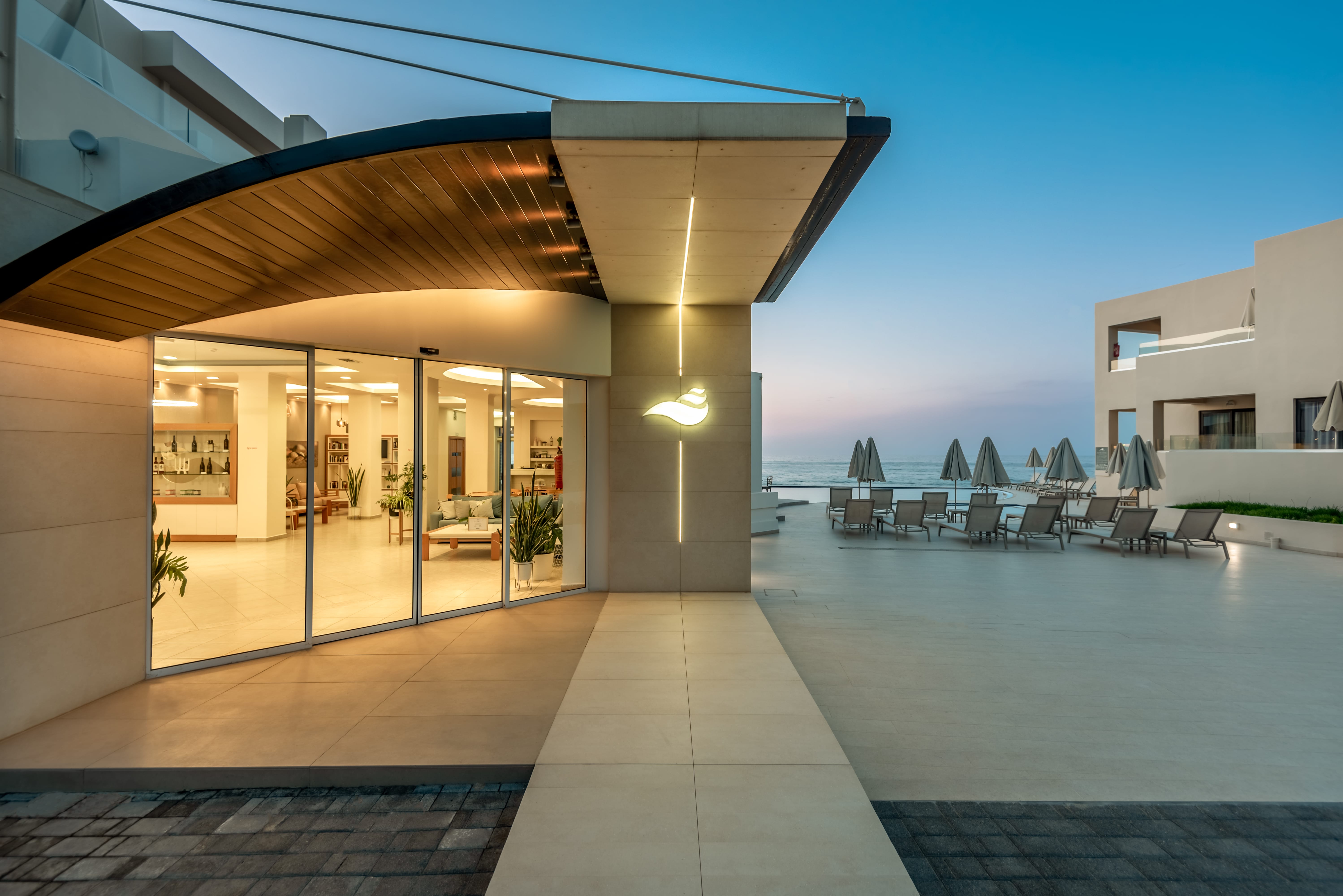 a swimming pool with a building in the background