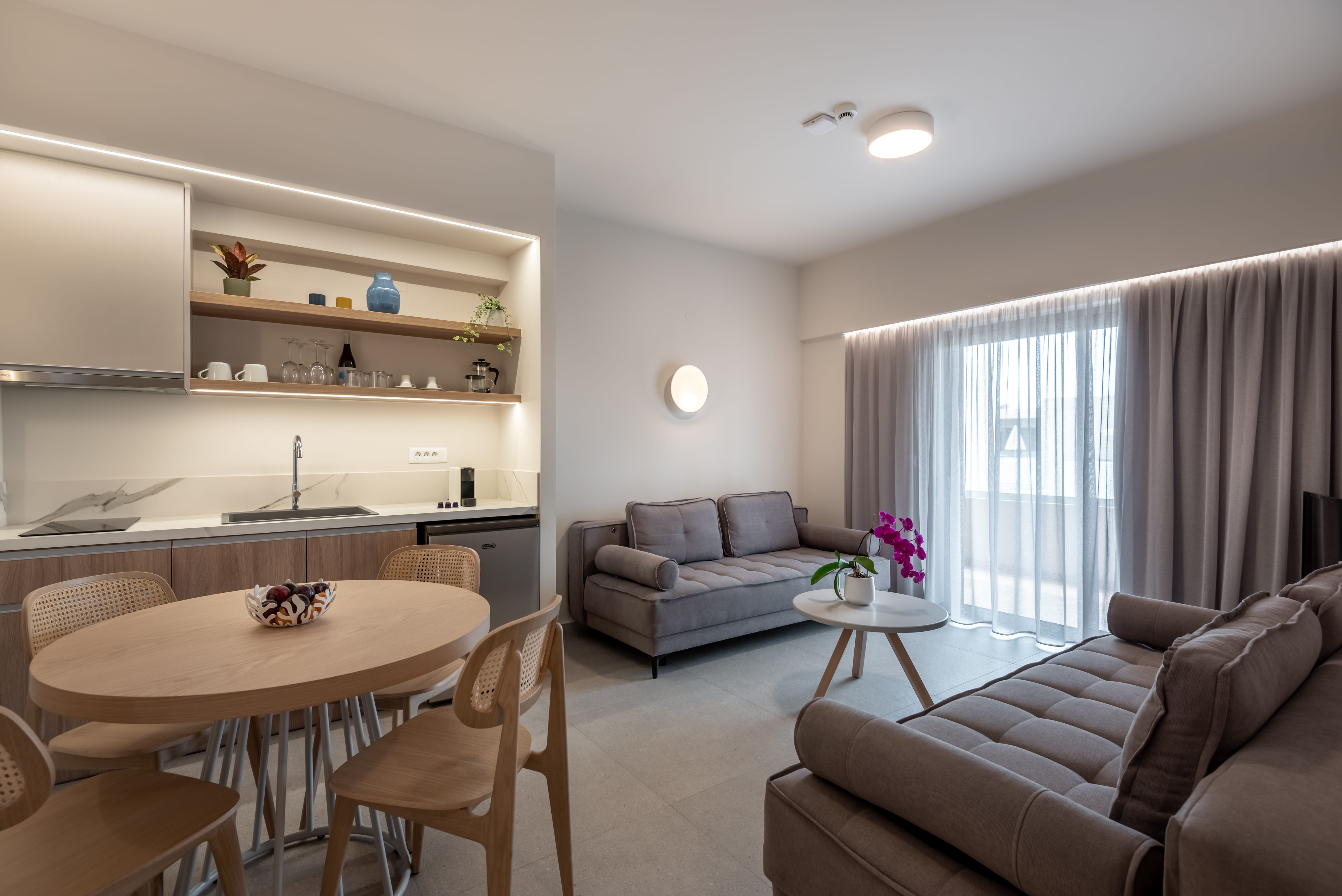 a living room with a couch and a table