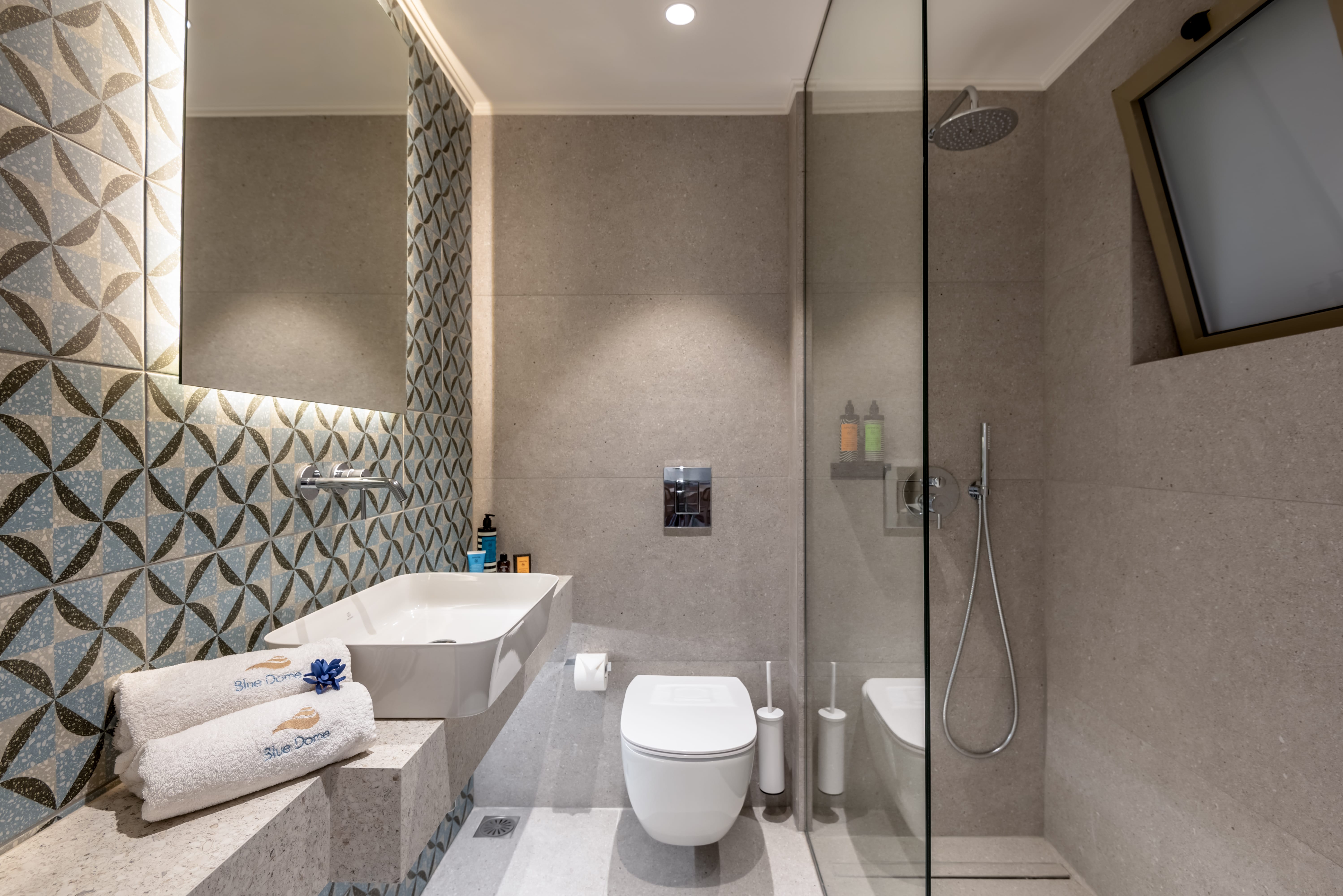 a bathroom with a glass shower