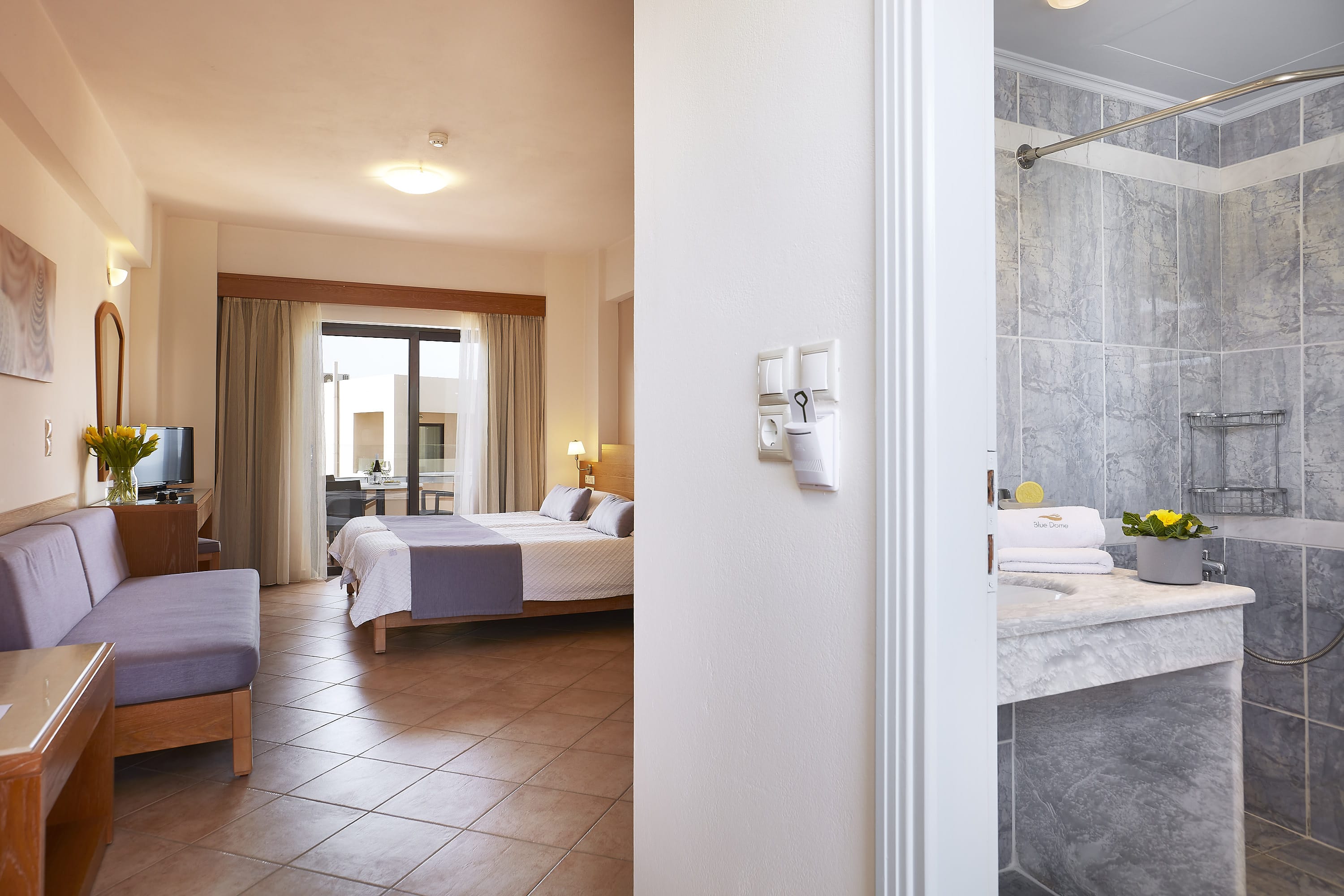 a bedroom with a bed and a bathtub