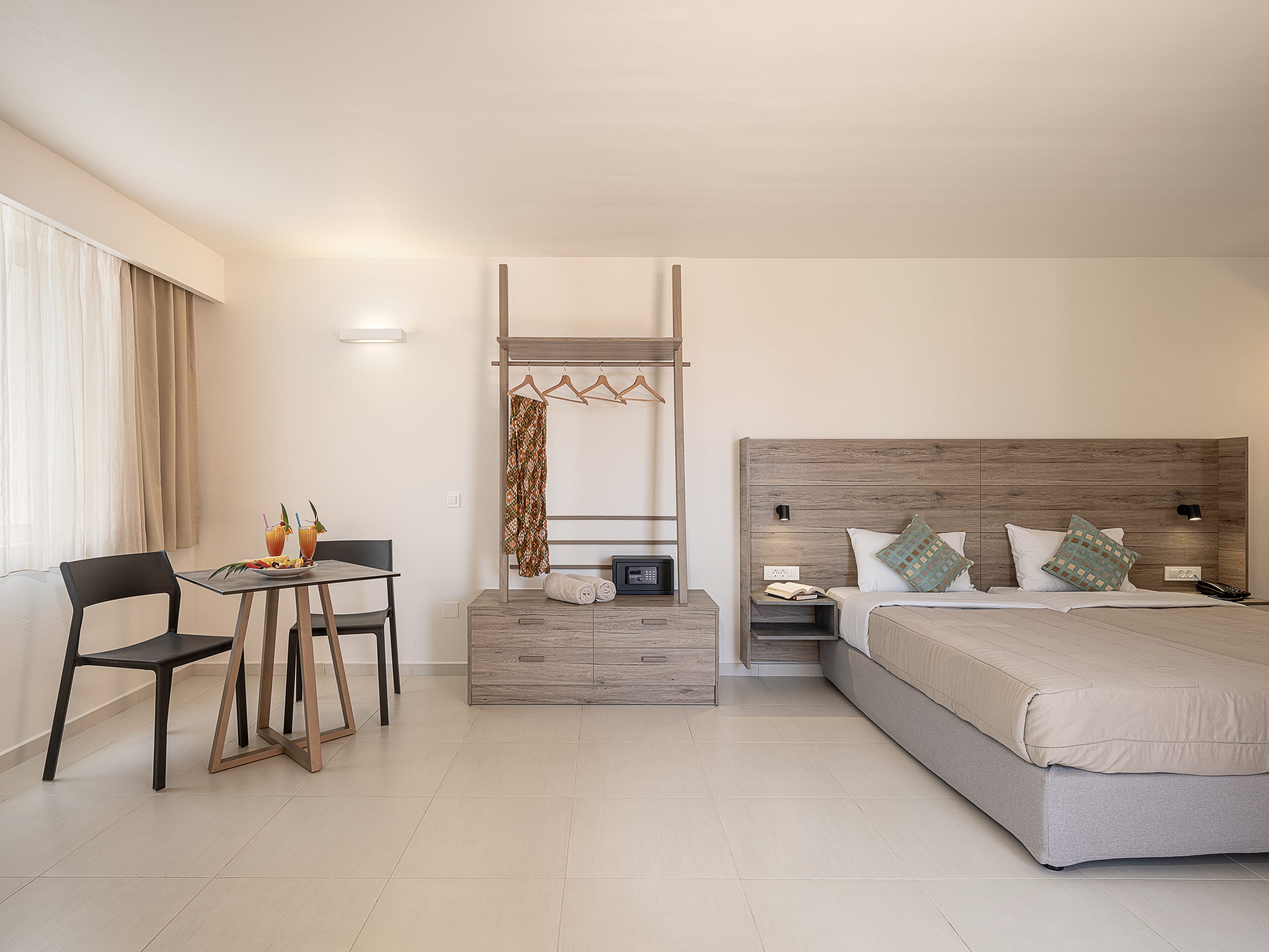 a bedroom with a bed and a table