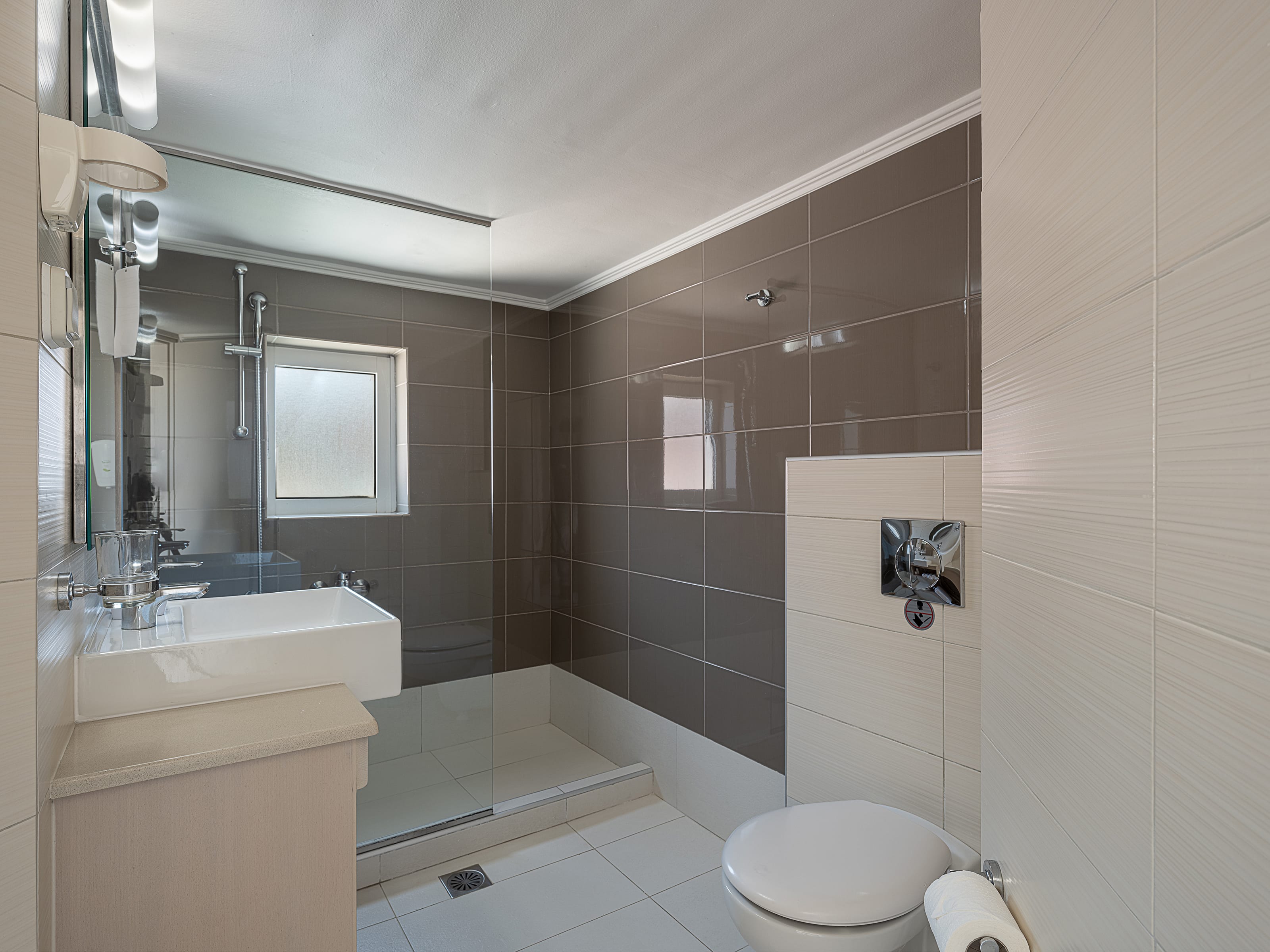 a bathroom with a tub toilet and sink