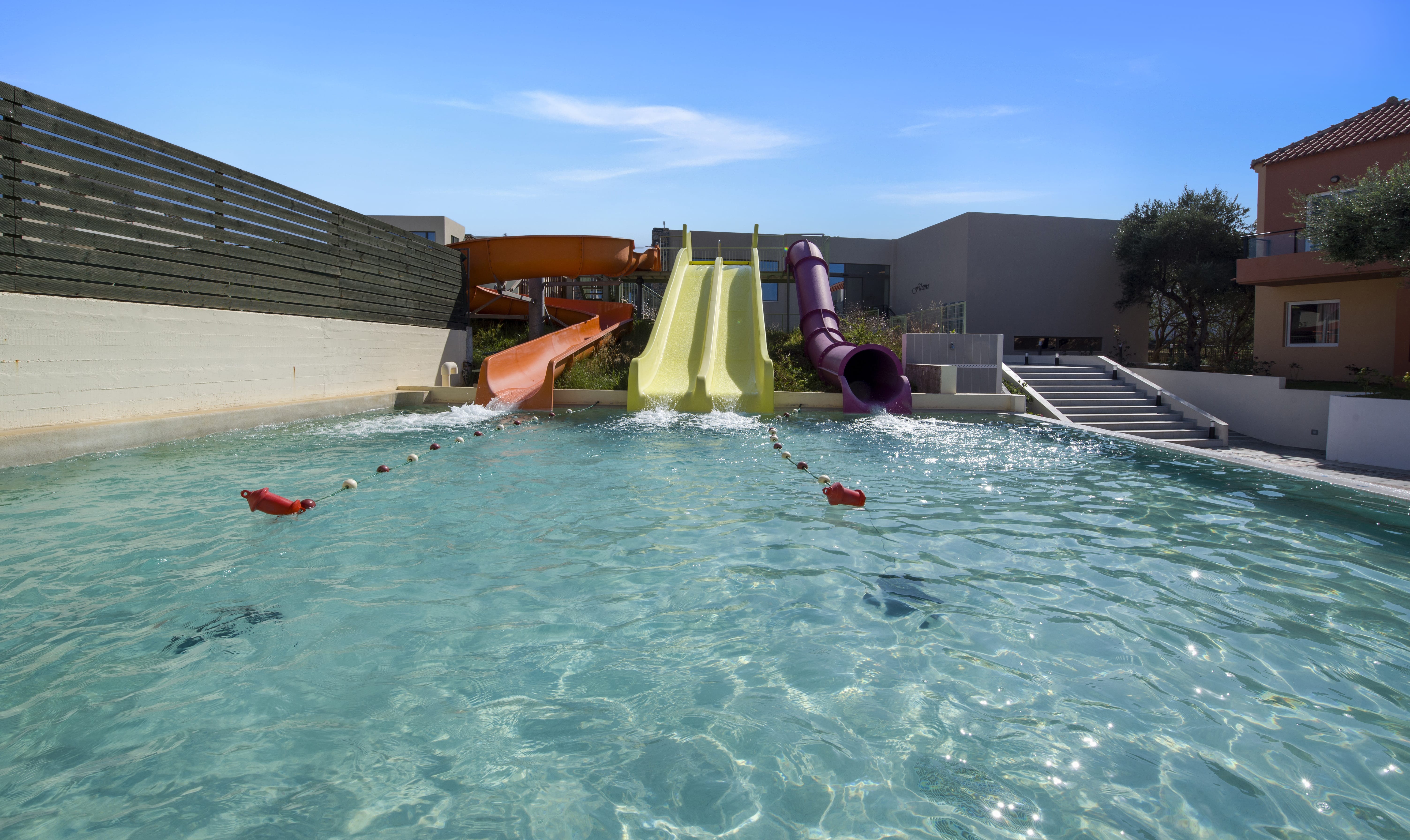 a swimming pool with a slide