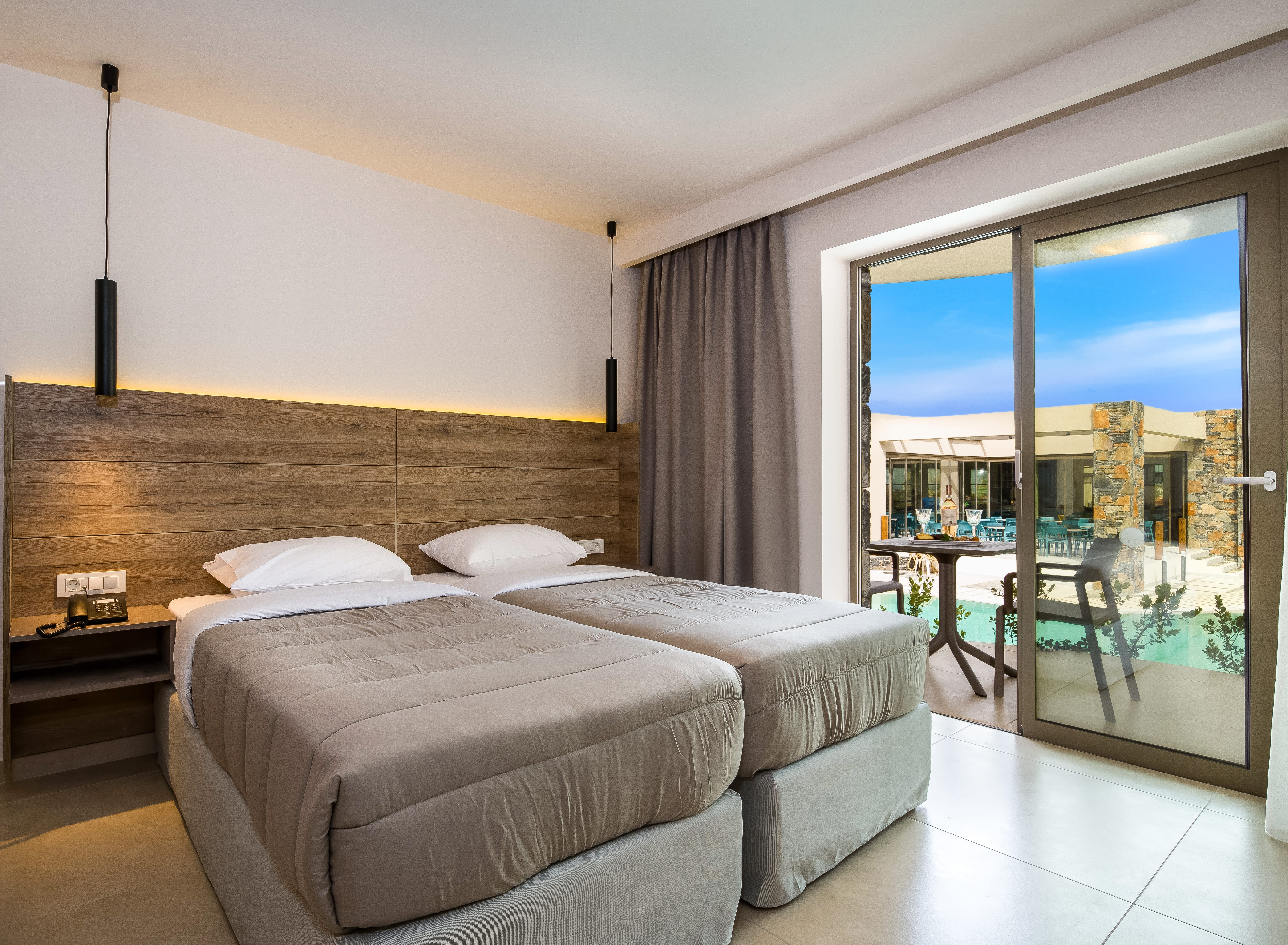 a bedroom with a large window