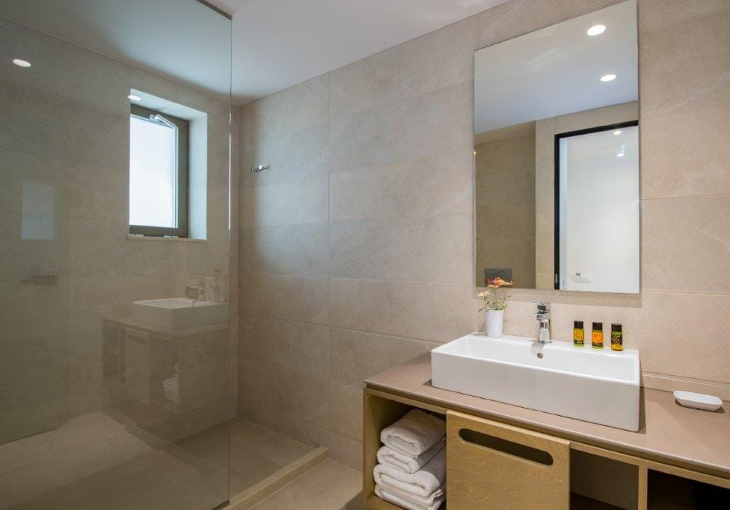 a bathroom with a large mirror