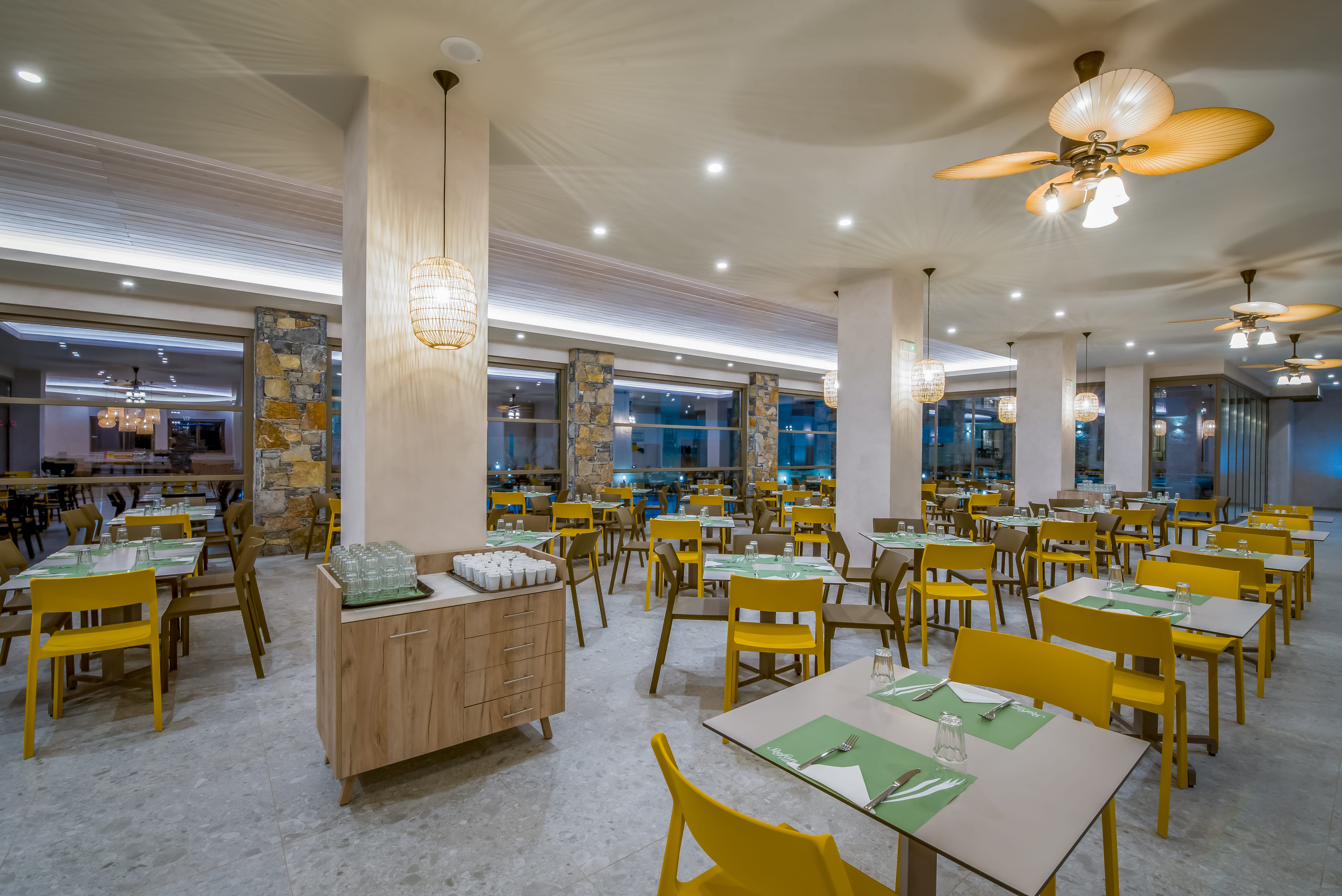 a room with tables and chairs