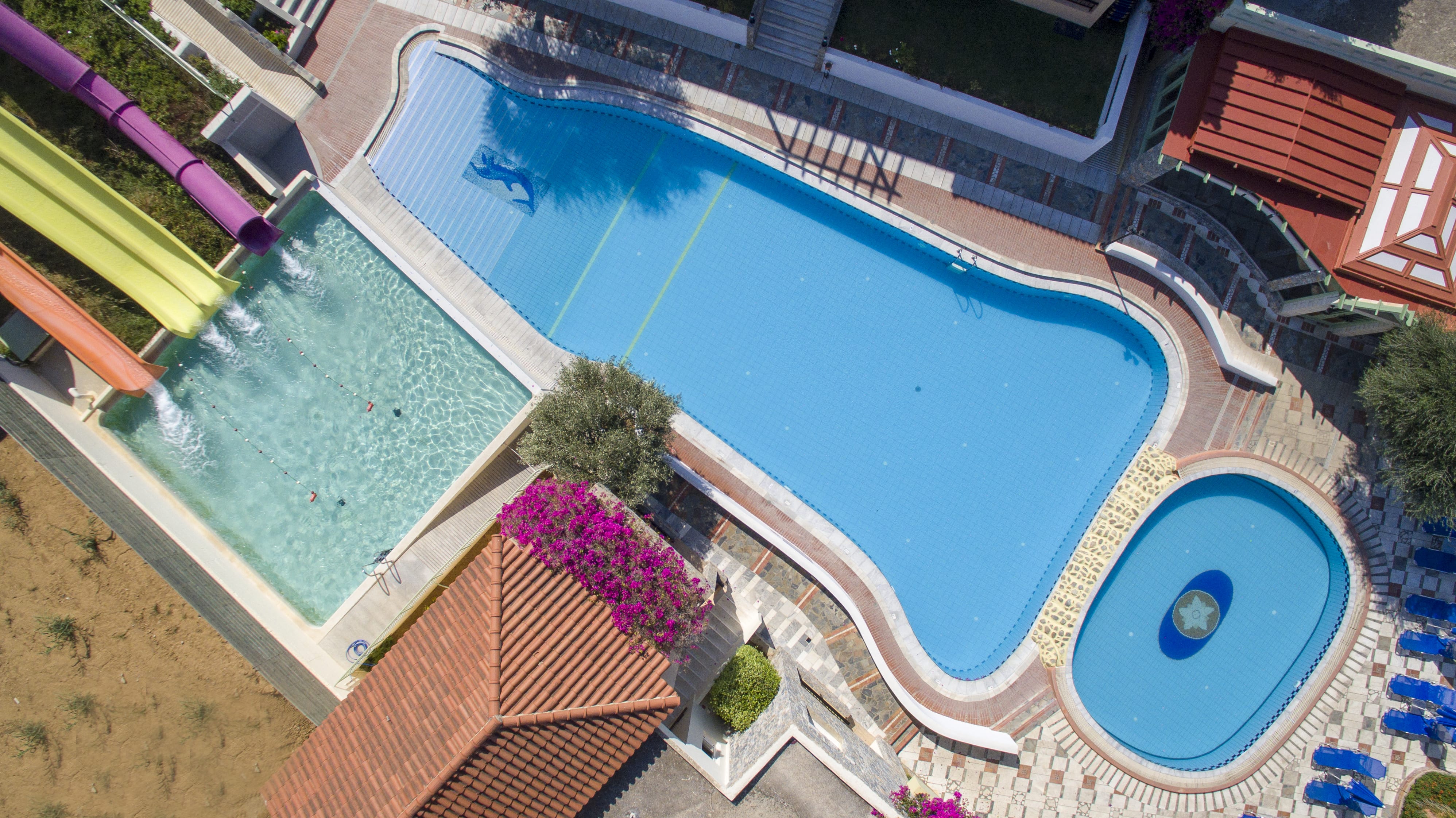 a pool with a building in the background