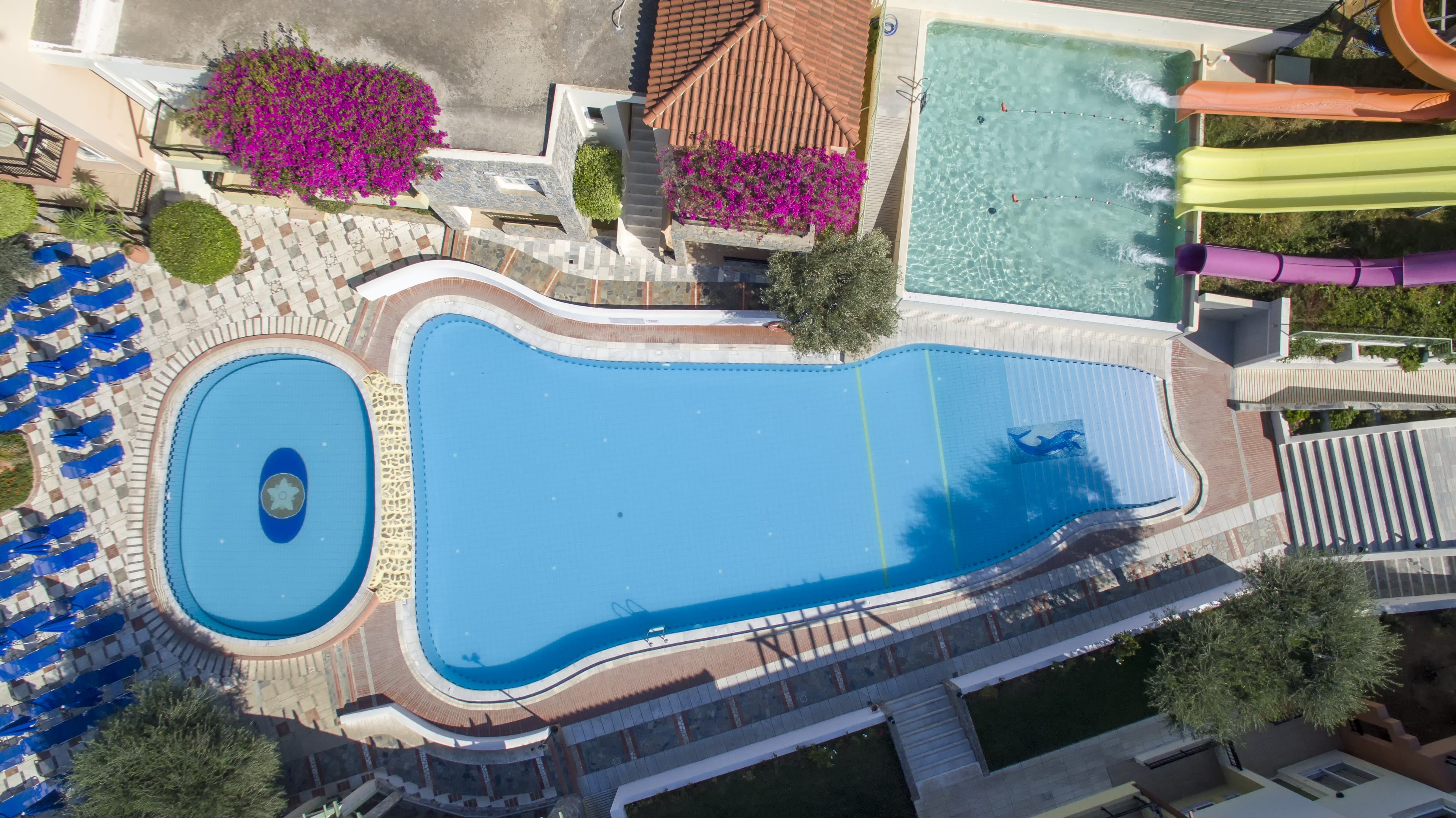a pool with a blue tile roof
