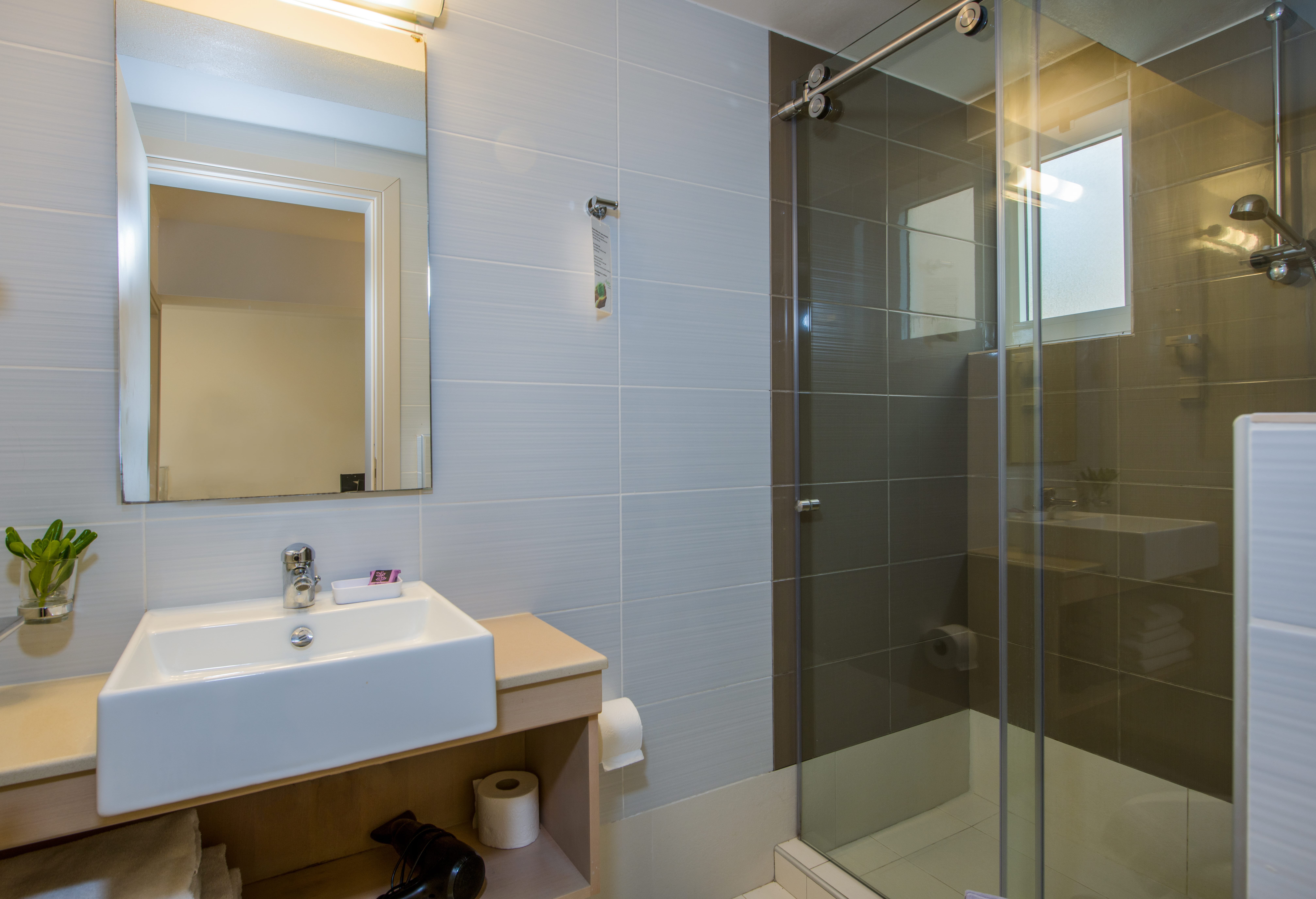 a bathroom with a glass shower