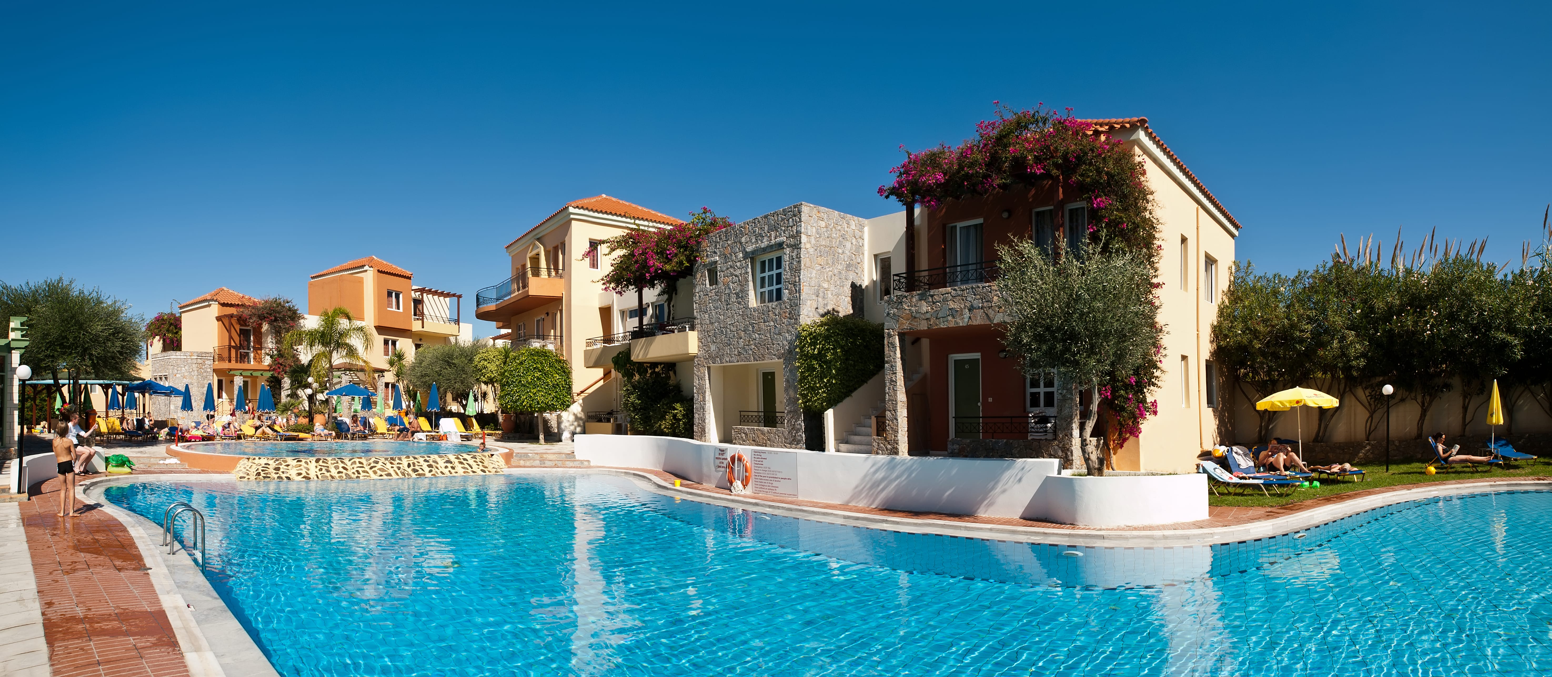a pool in front of a building