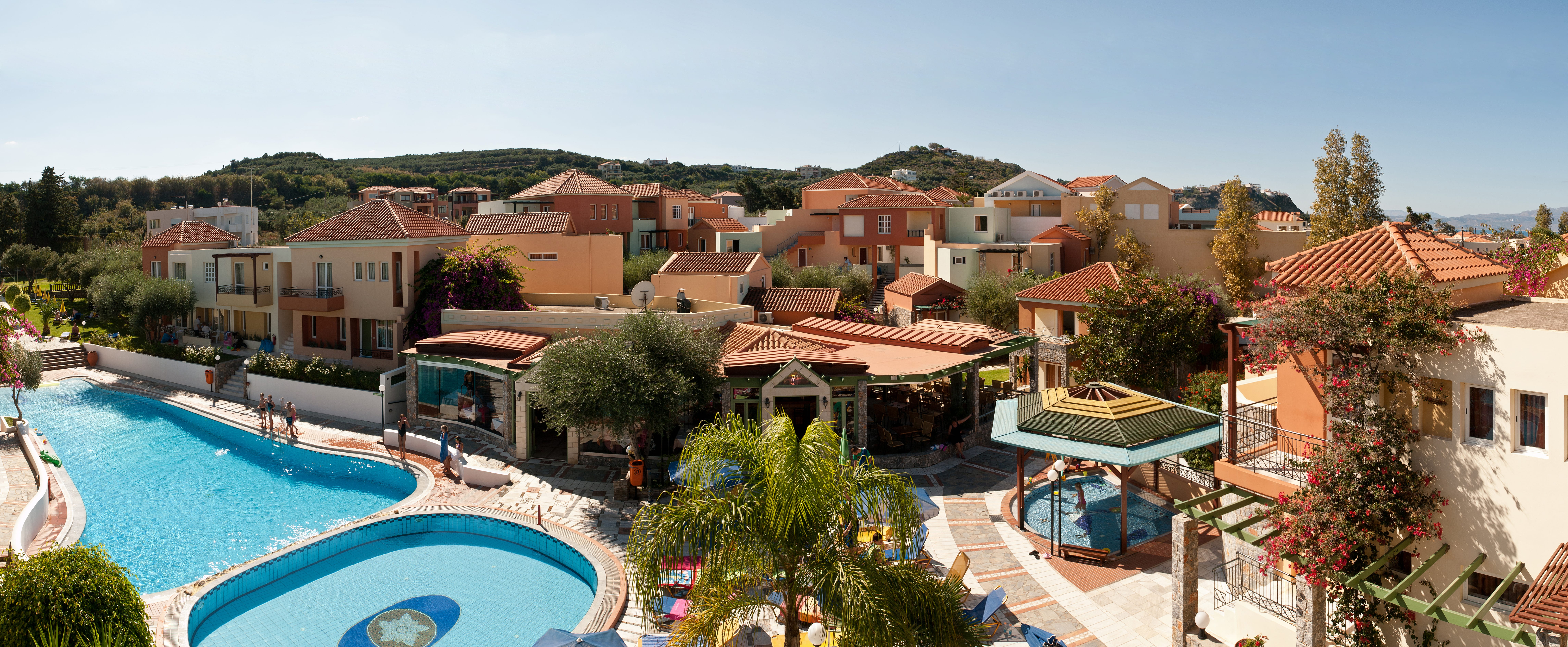 a pool surrounded by houses