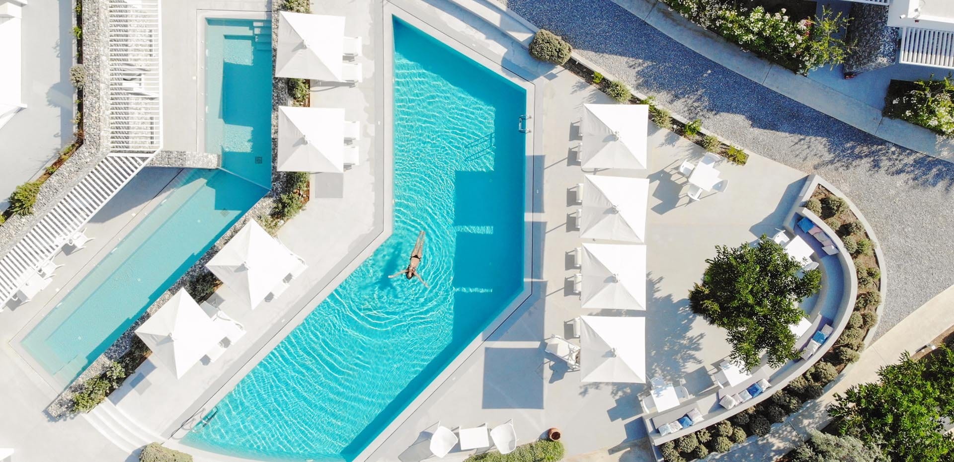 a pool with a building in the background