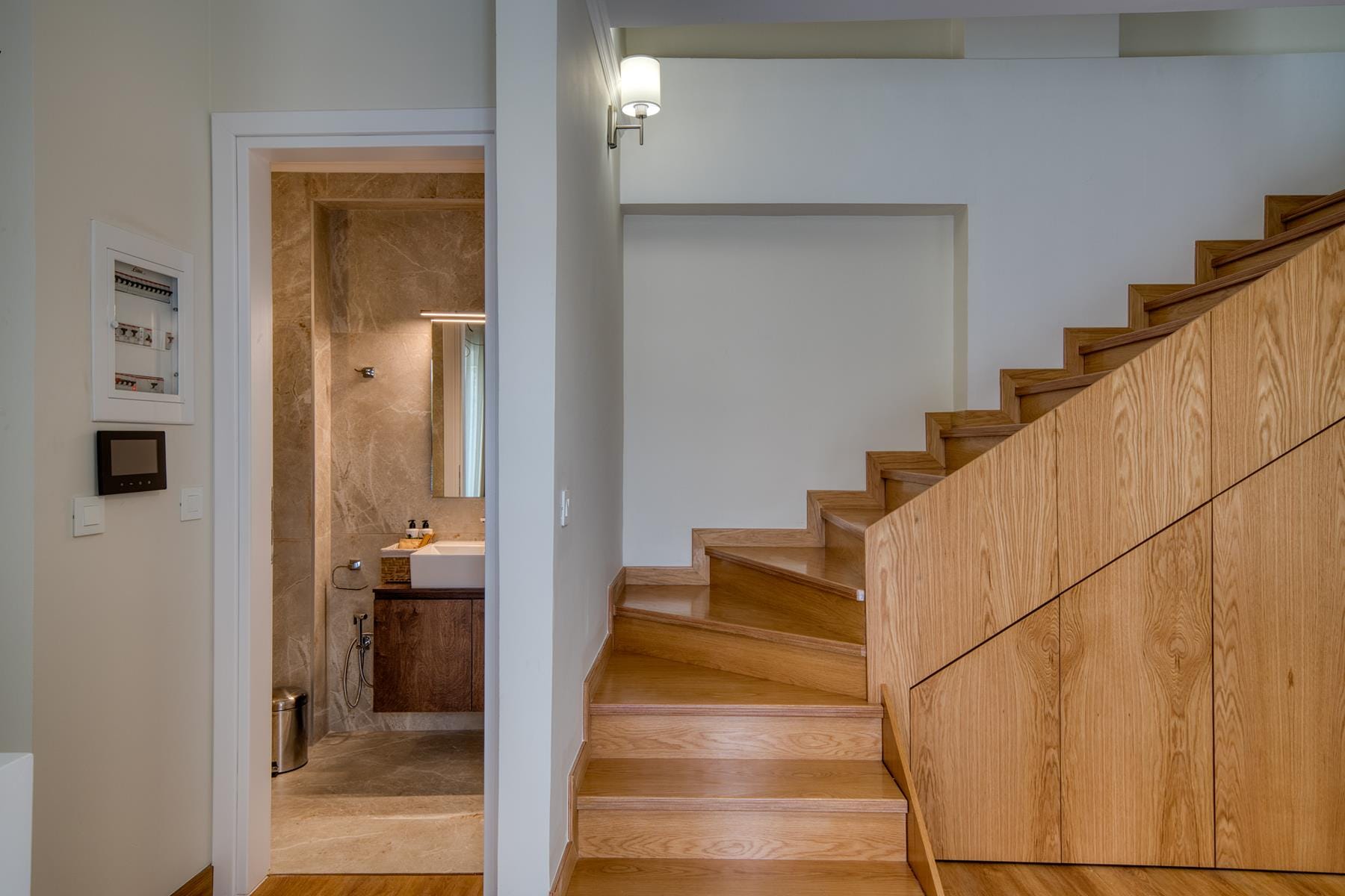 a staircase leading to a bathroom