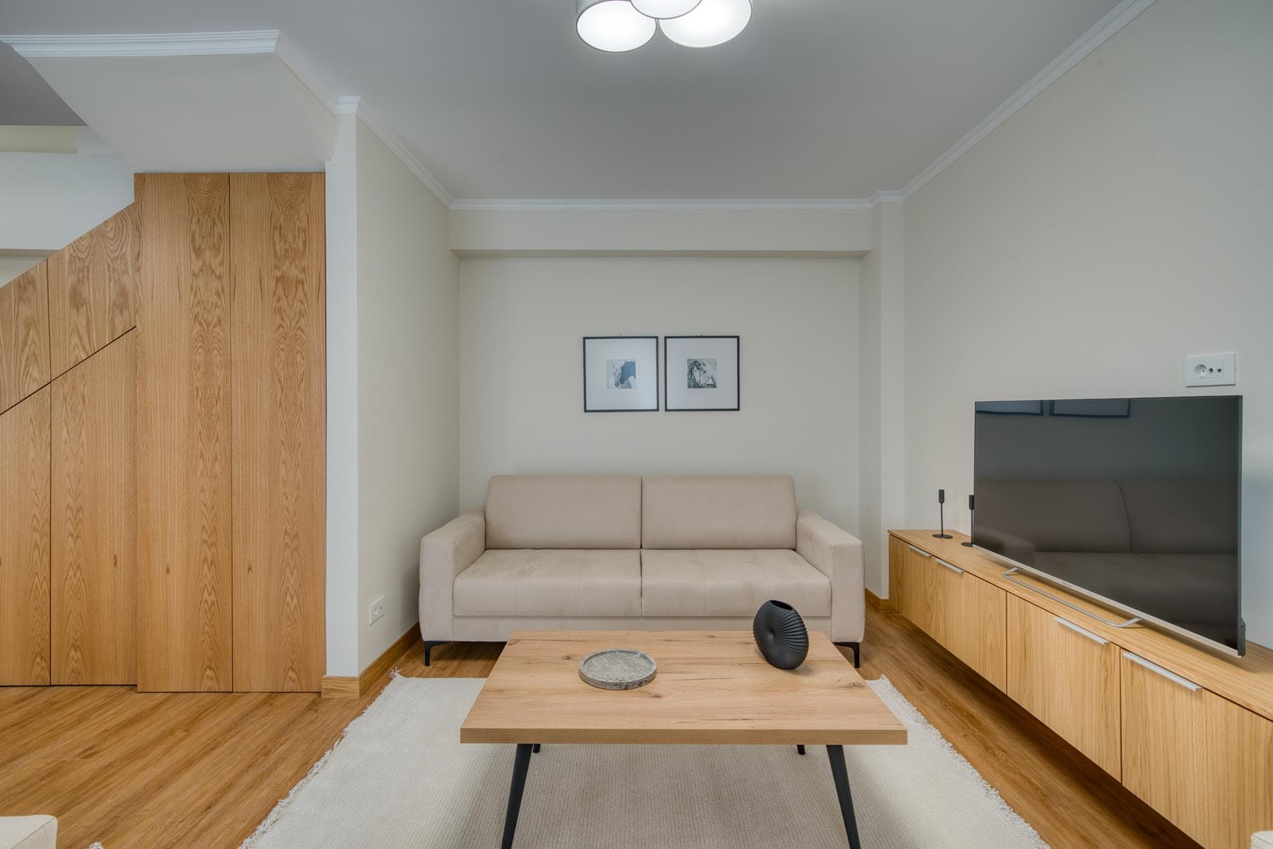 a living room with a tv and a couch