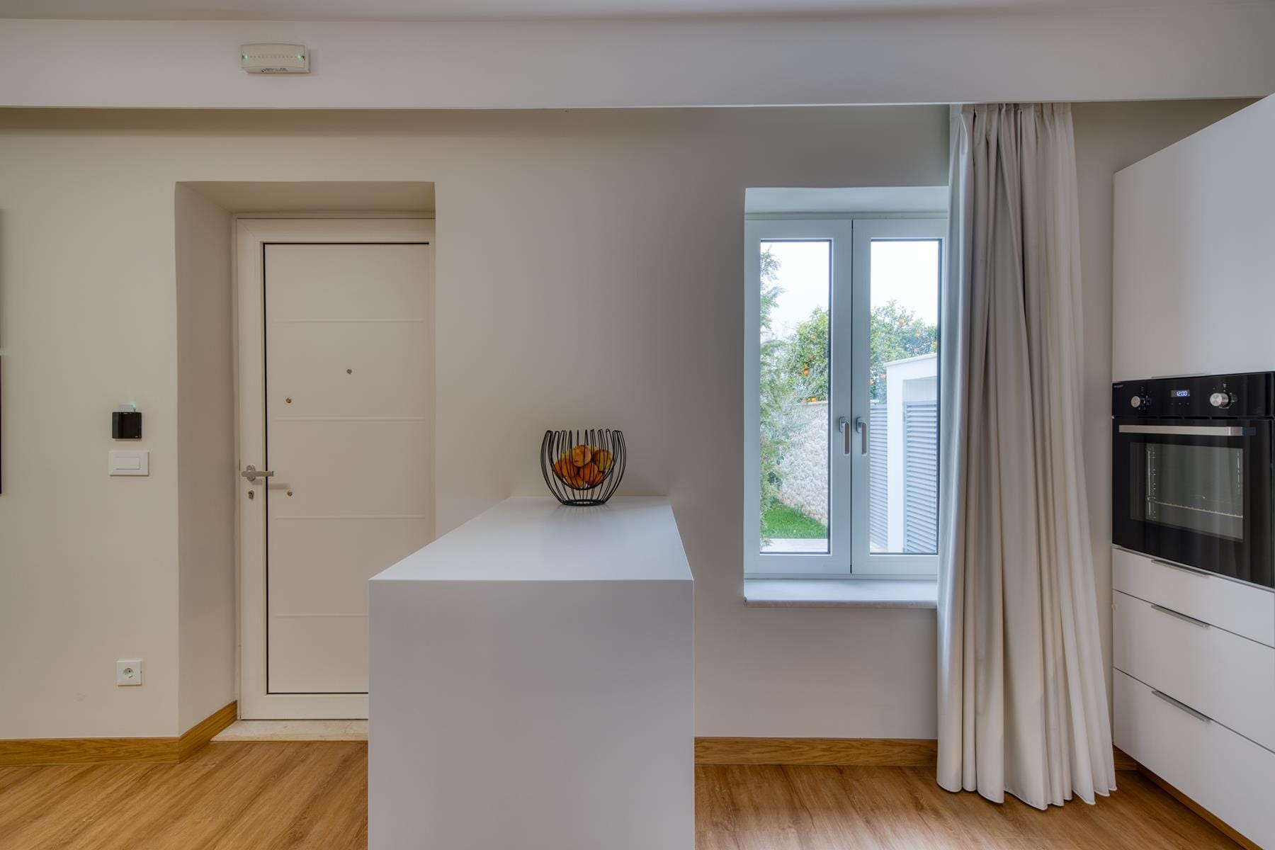 a kitchen with a sink and a window