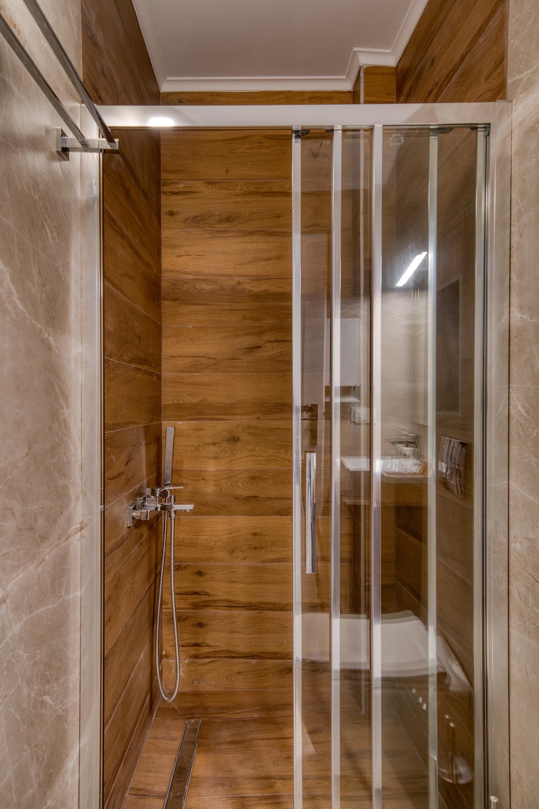 a shower with a glass door