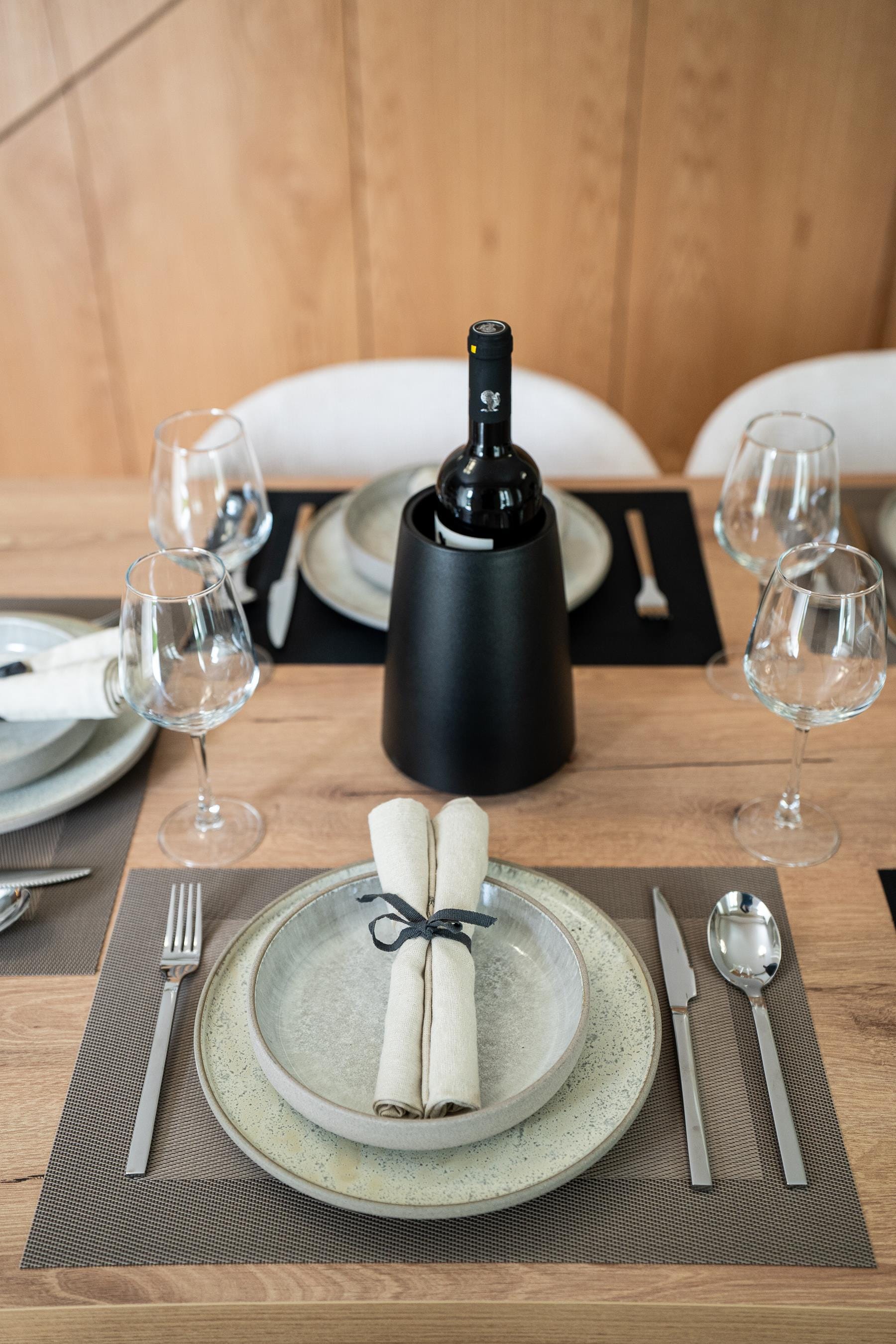 a table with plates and glasses