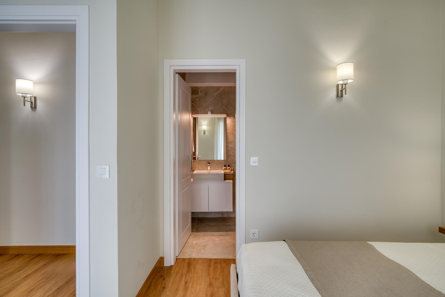 a room with a door and a mirror