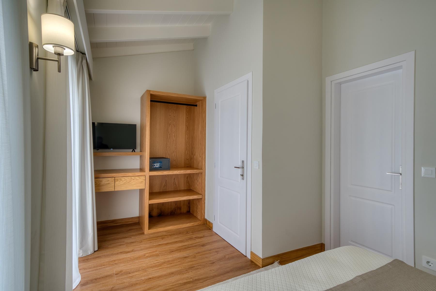 a room with a wood floor and a wood floor