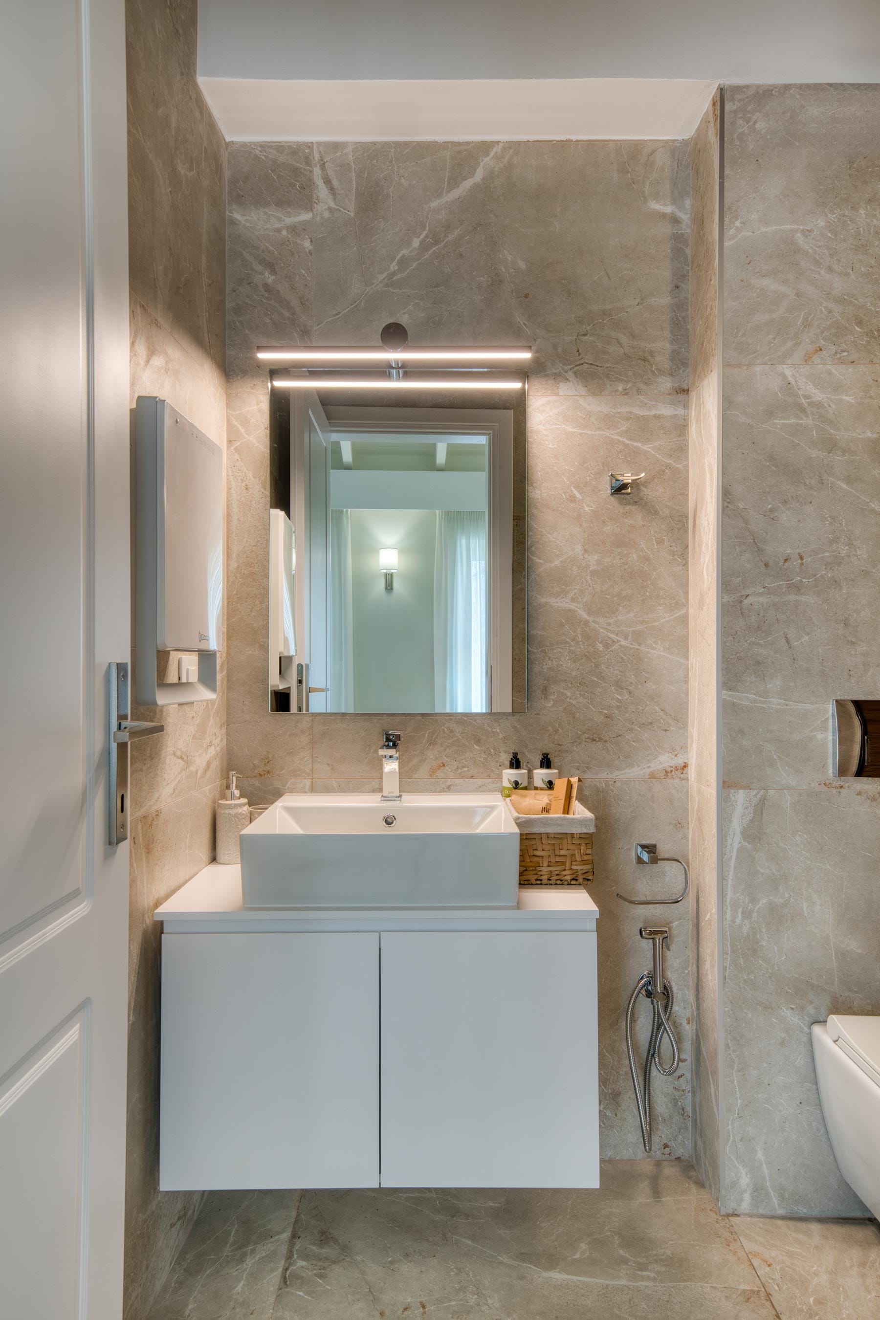 a bathroom with a large mirror