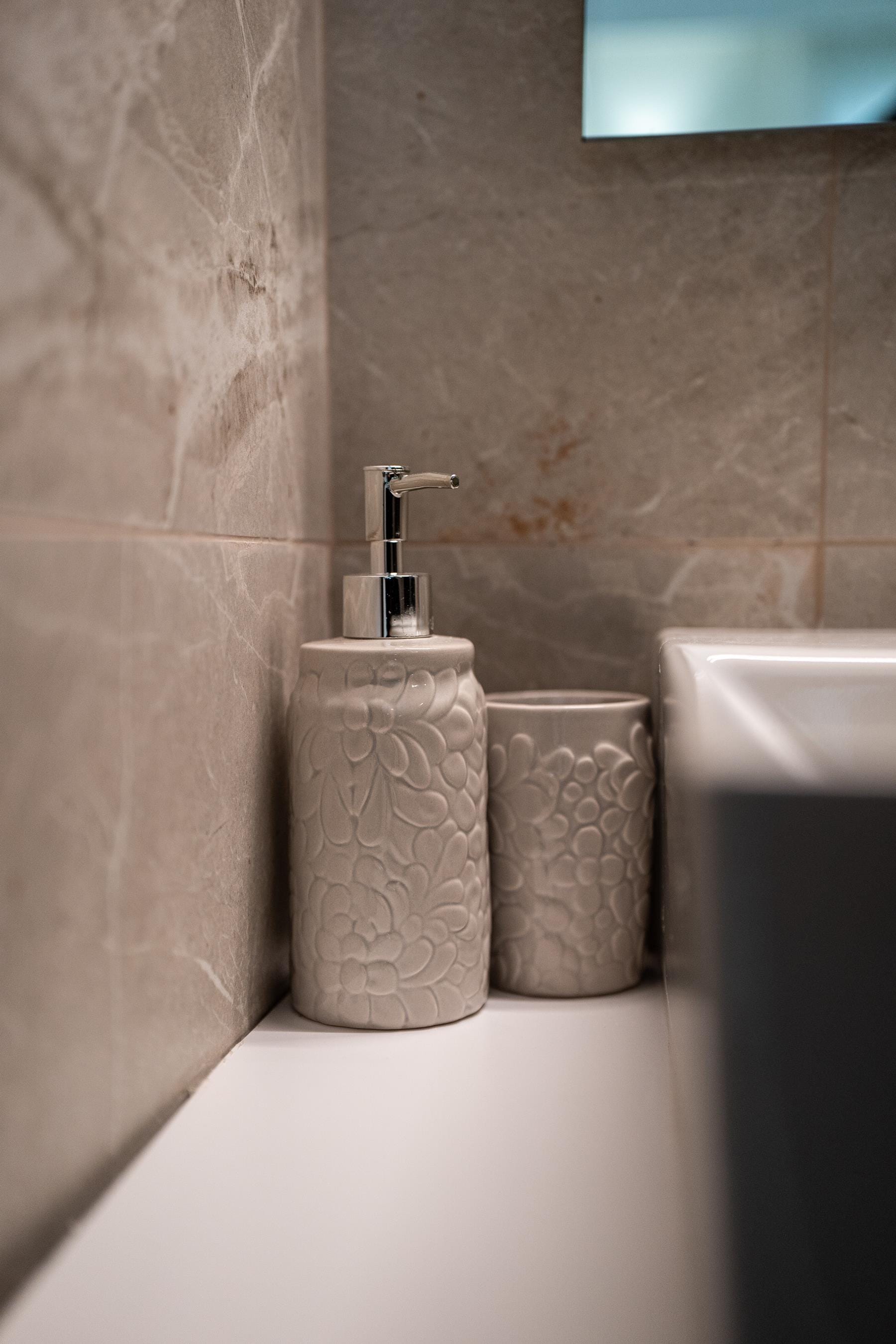 a bathroom with a sink and a toilet