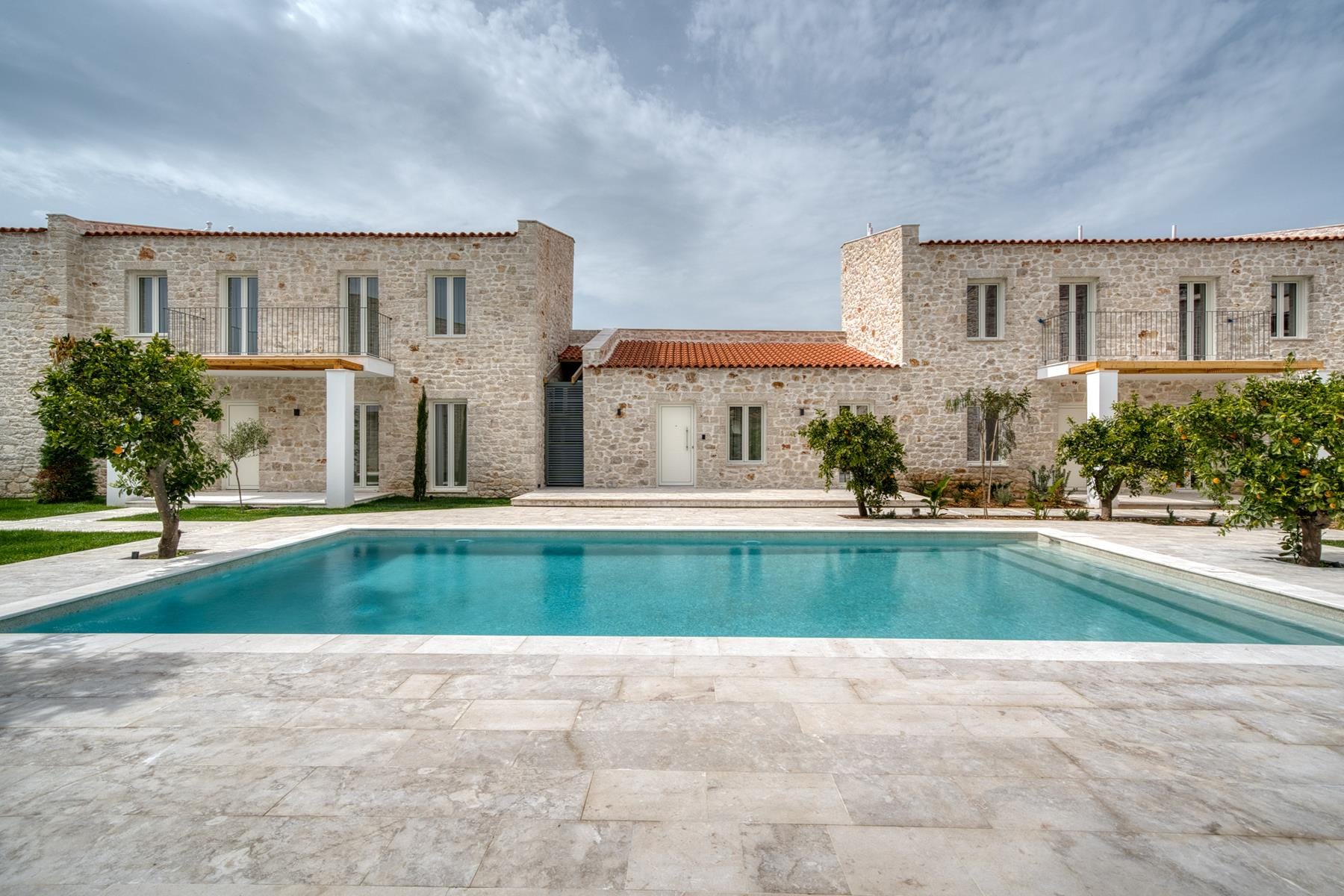 a pool in front of a building