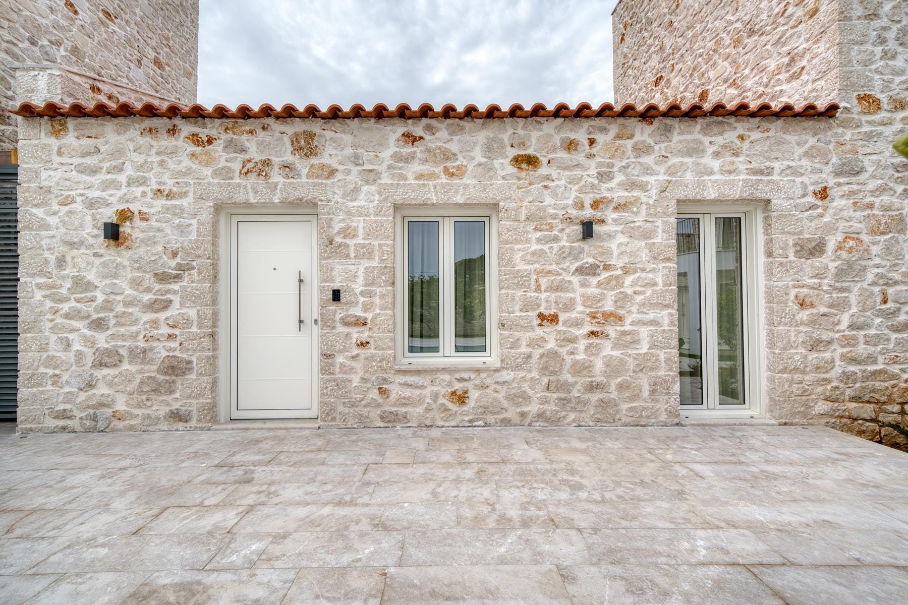 a stone building with windows