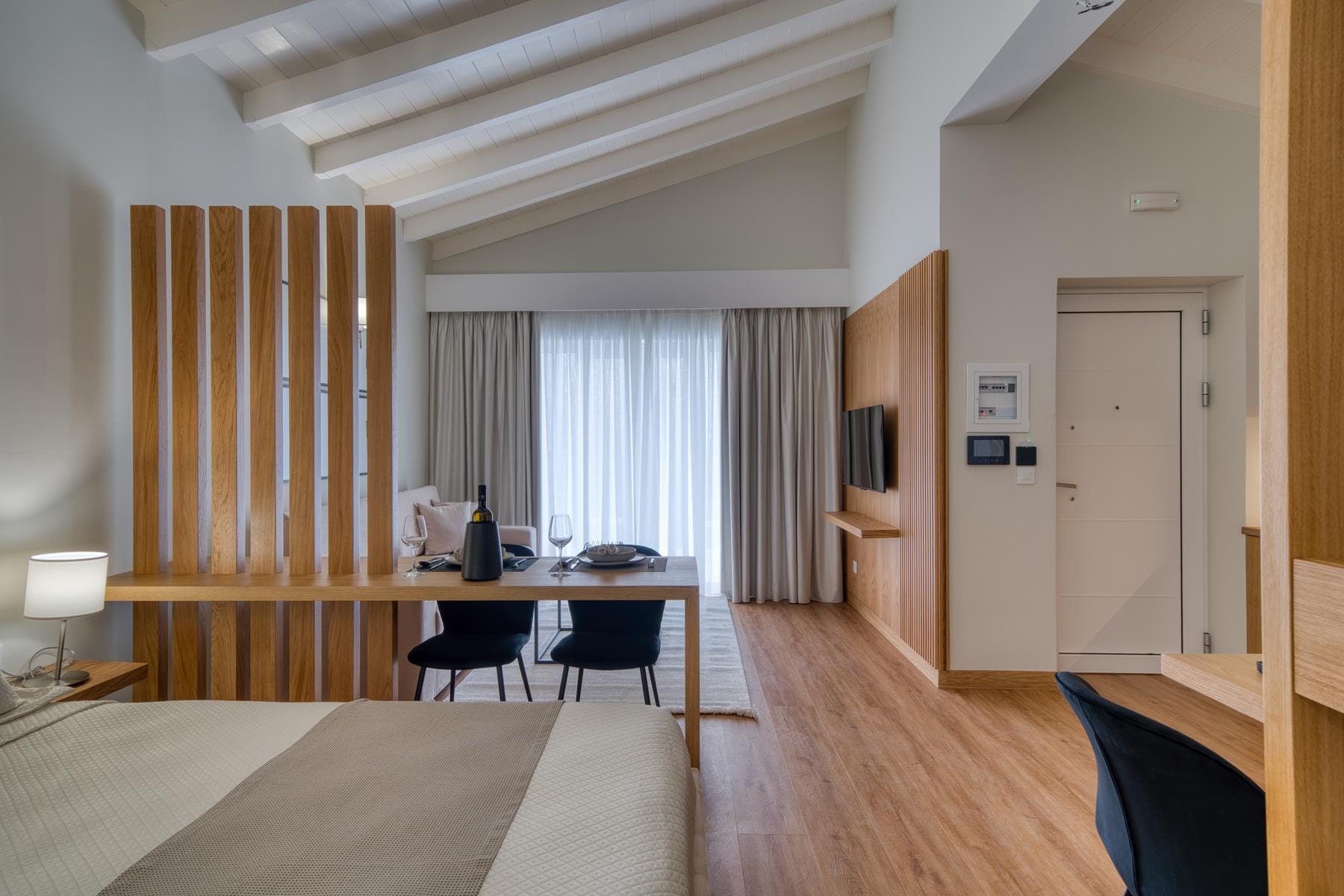 a room with a bed and a table